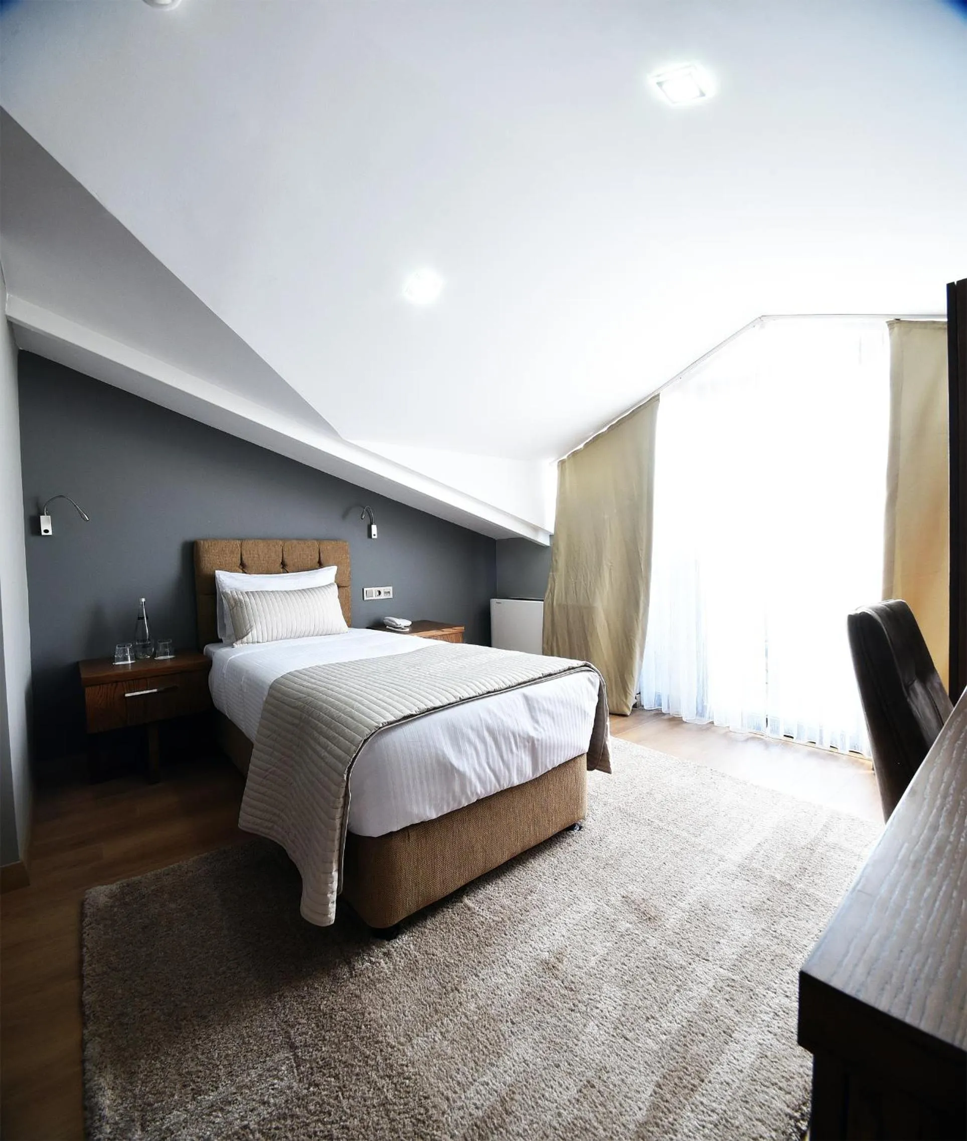 Bed in The Elegant Hotel