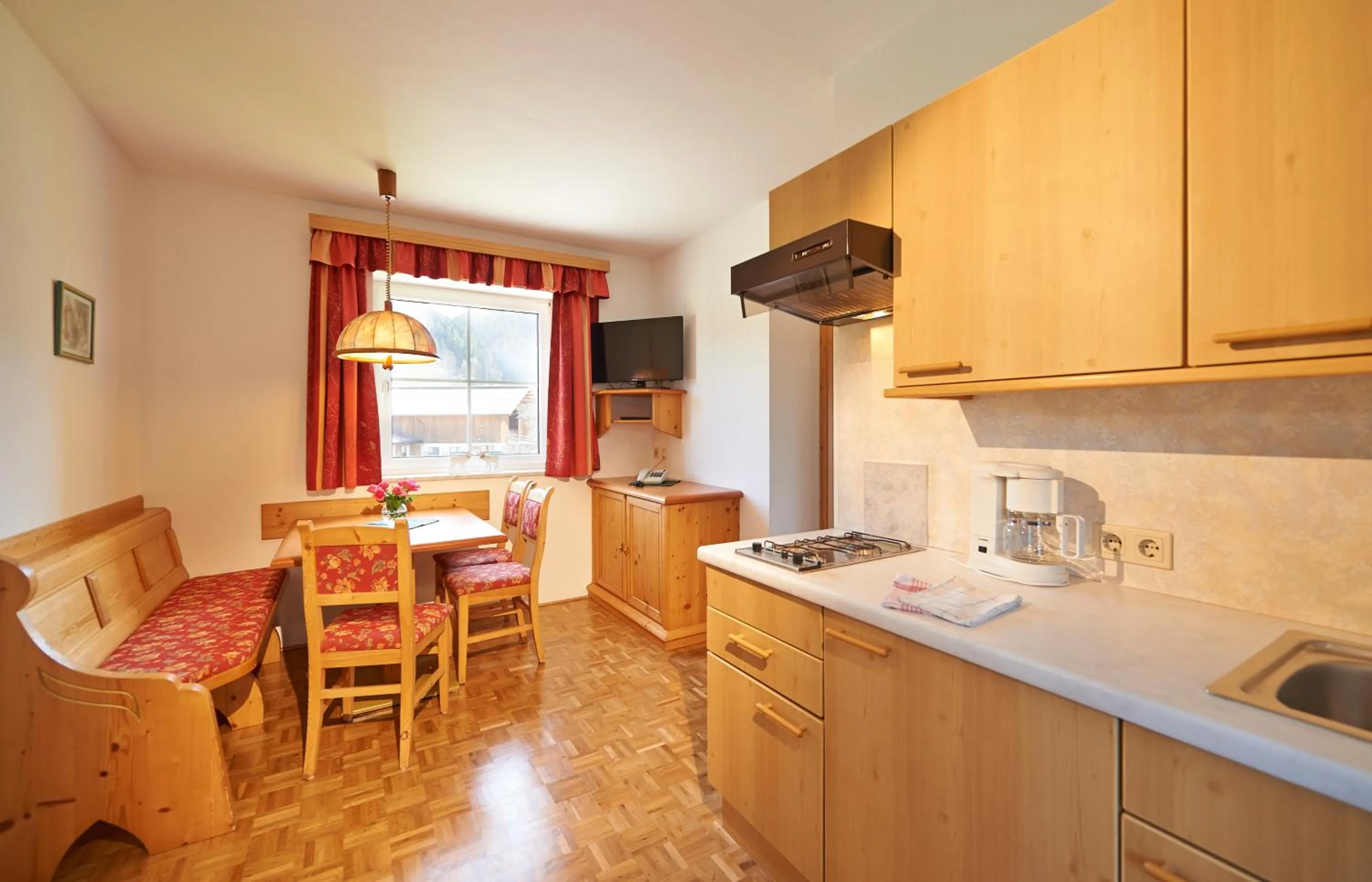 Kitchen or kitchenette in Aparthotel Paradies - Schrempfgut