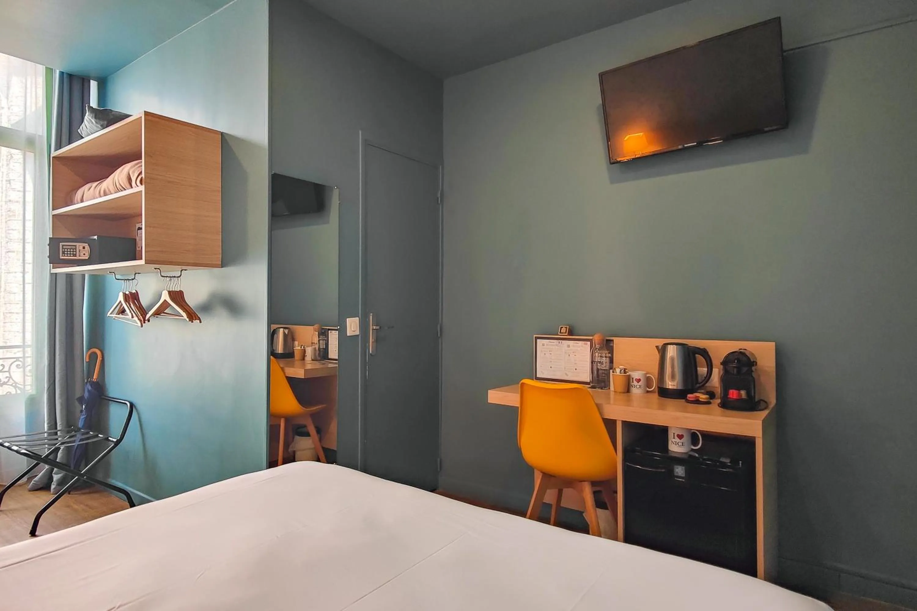 Photo of the whole room, Bed in Hôtel Du Centre, un hôtel AMMI