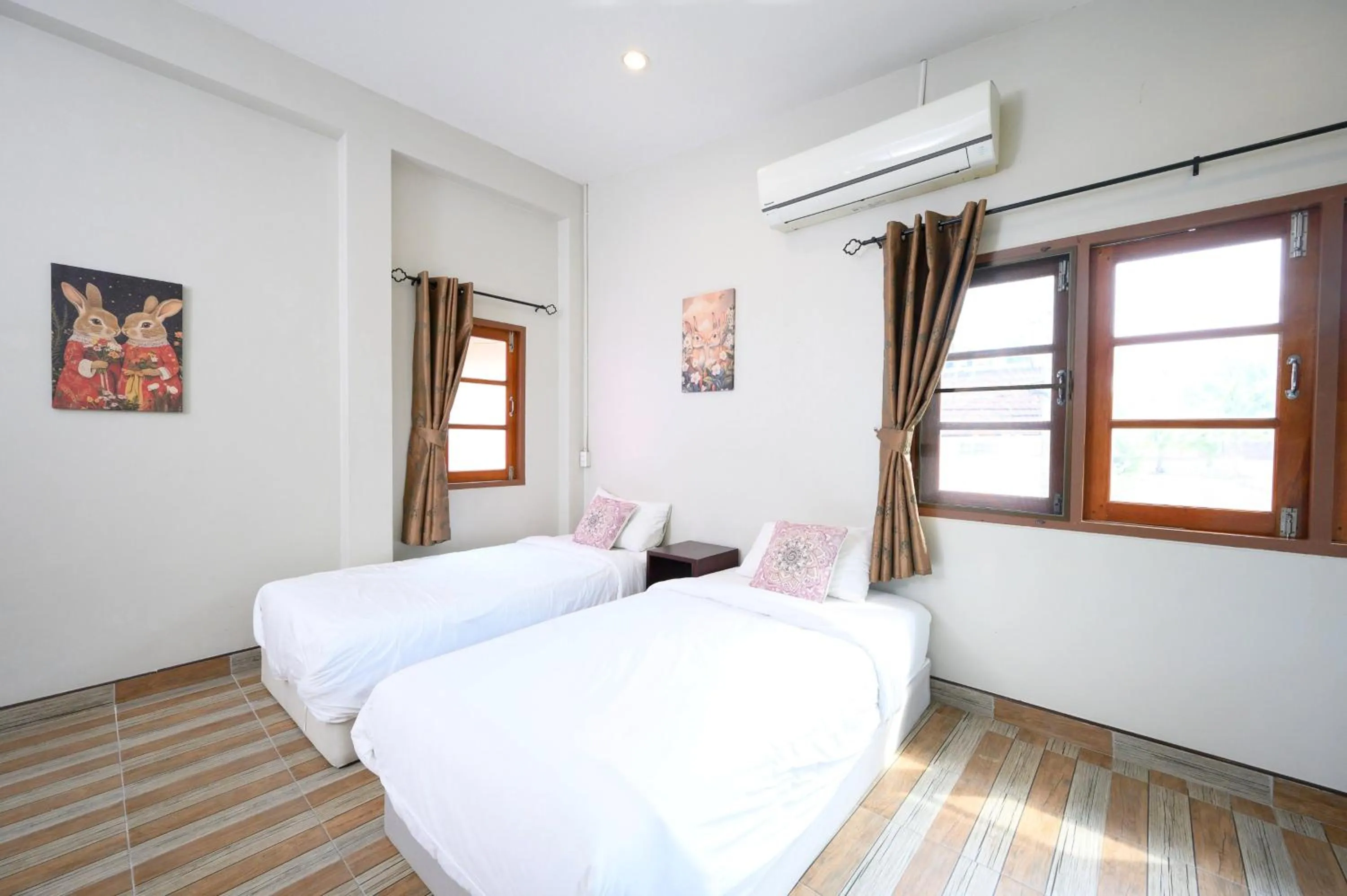 Bed in Busaya Resort & Cuisine