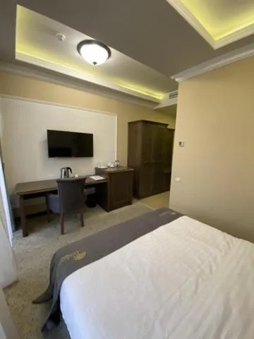 Bed in Boulevard Hotel