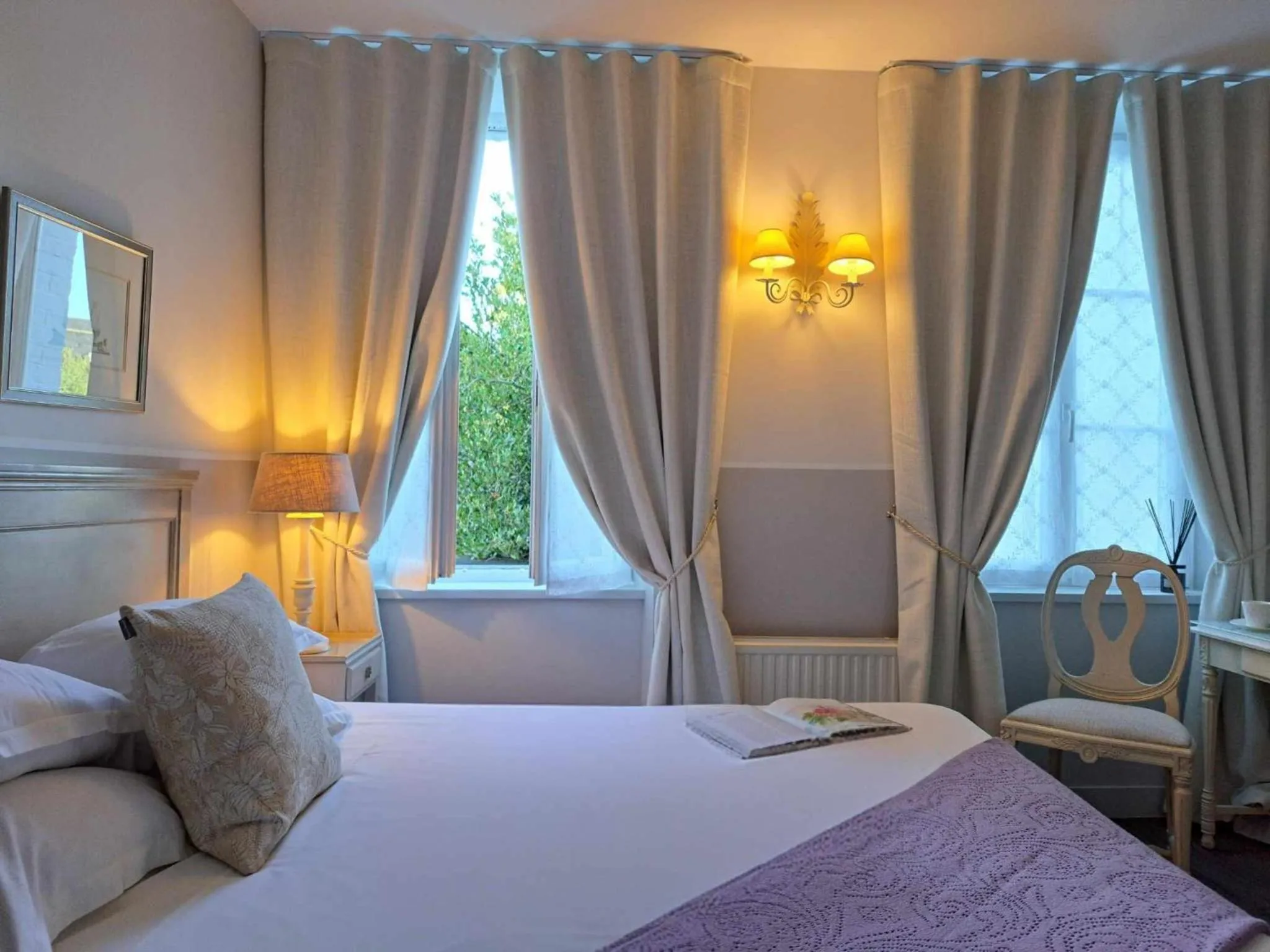 Bed in Hôtel Traiteur Les Ormes, The Originals Relais