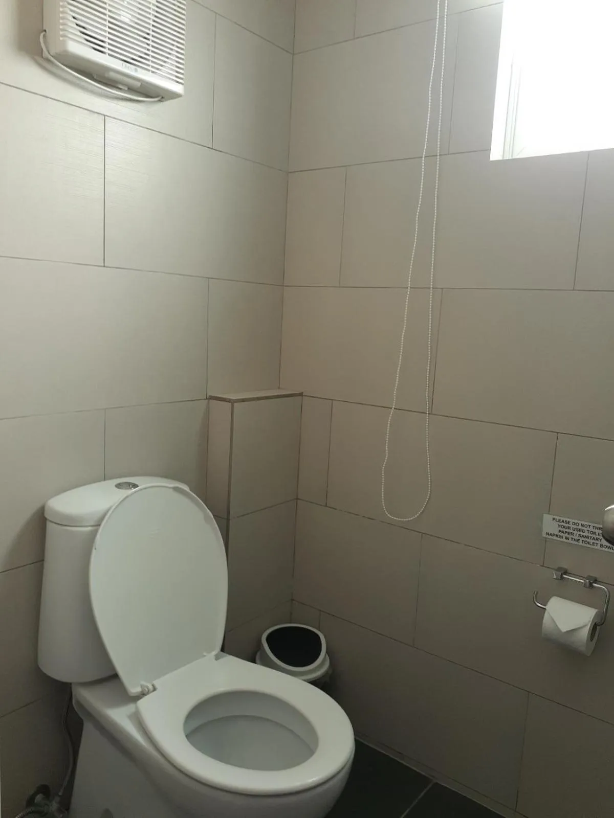 Toilet in Bluewaves Beach House