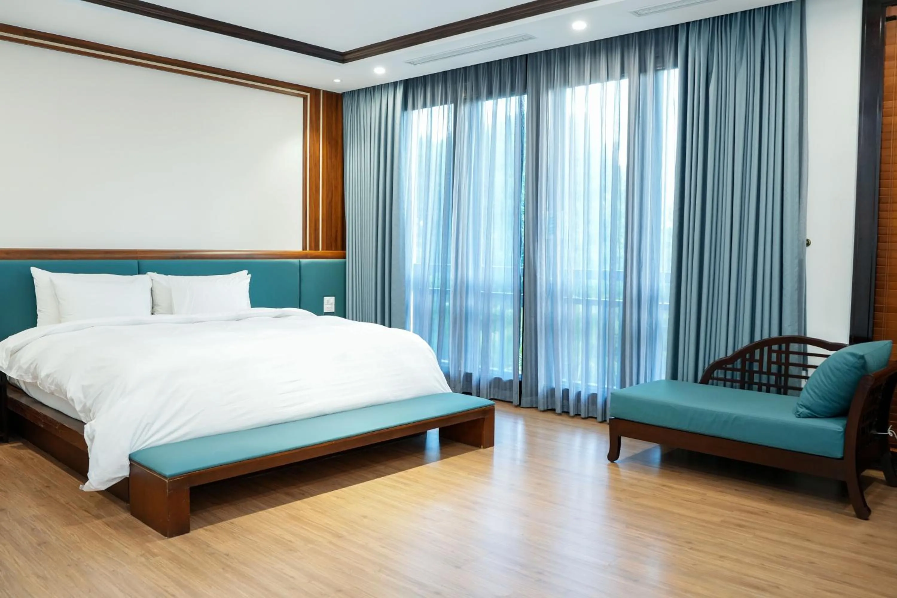 Bed in NCC Garden Villas - NCC Hotel