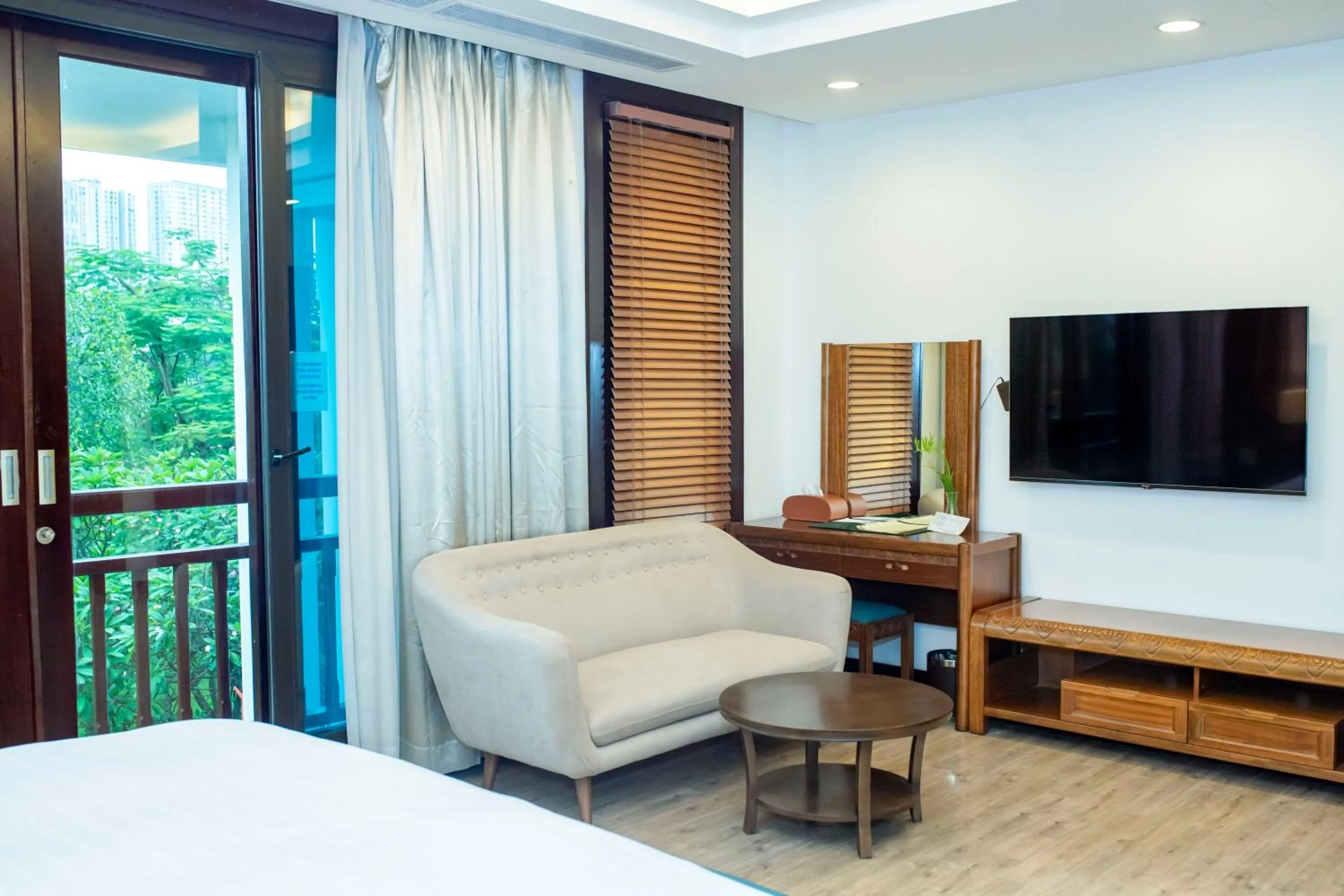 Bed in NCC Garden Villas - NCC Hotel