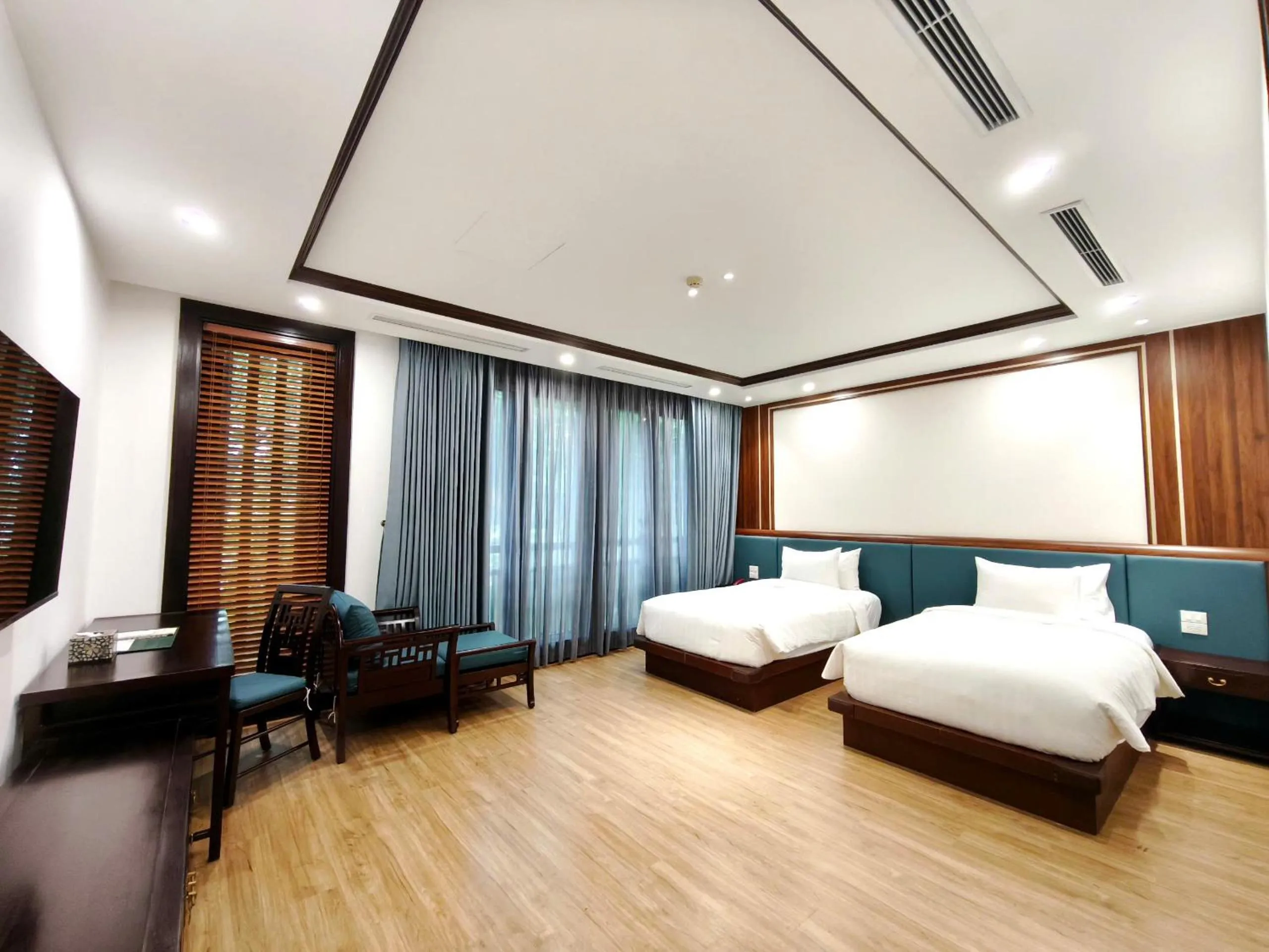 Bed in NCC Garden Villas - NCC Hotel