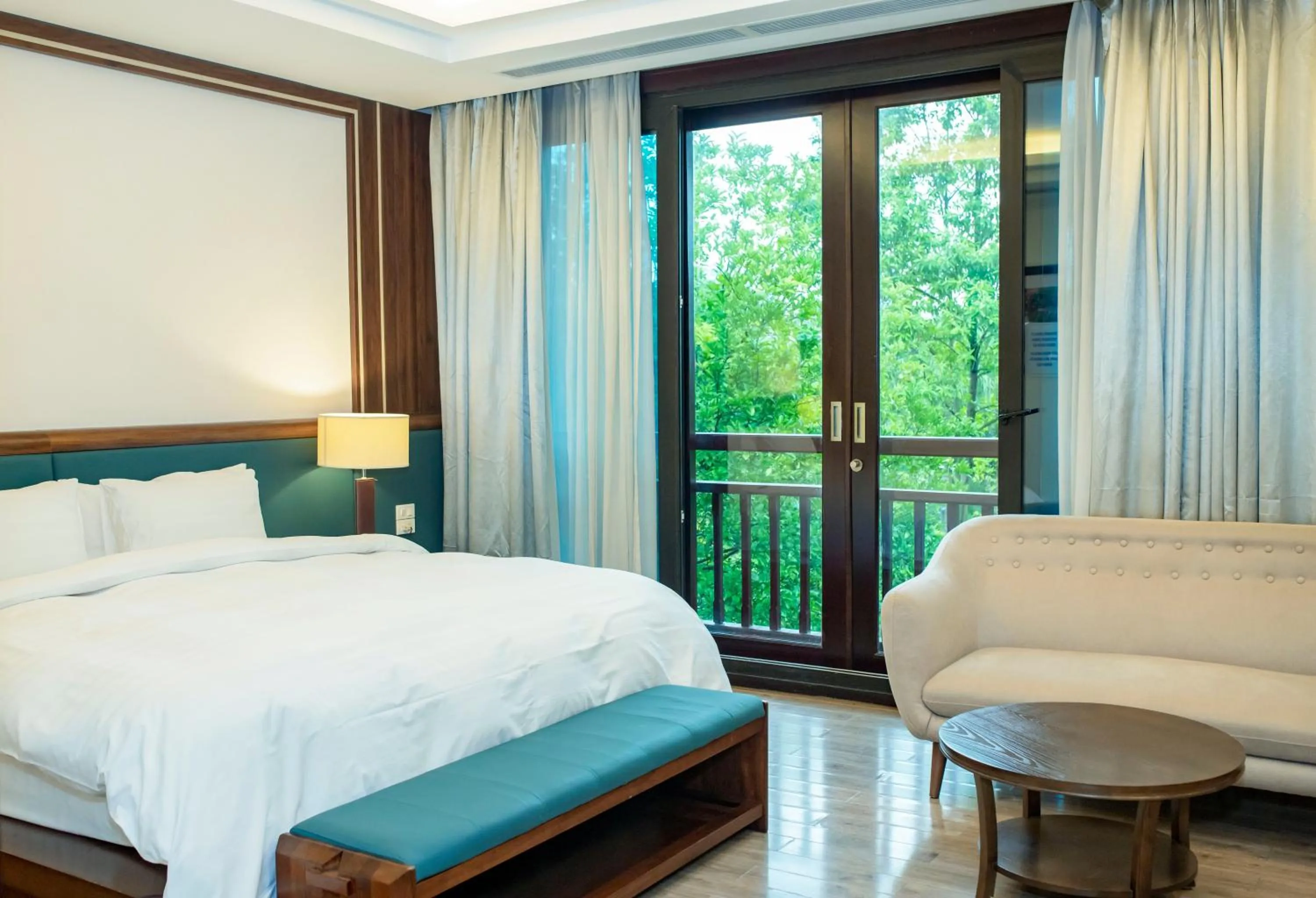 Bed in NCC Garden Villas - NCC Hotel