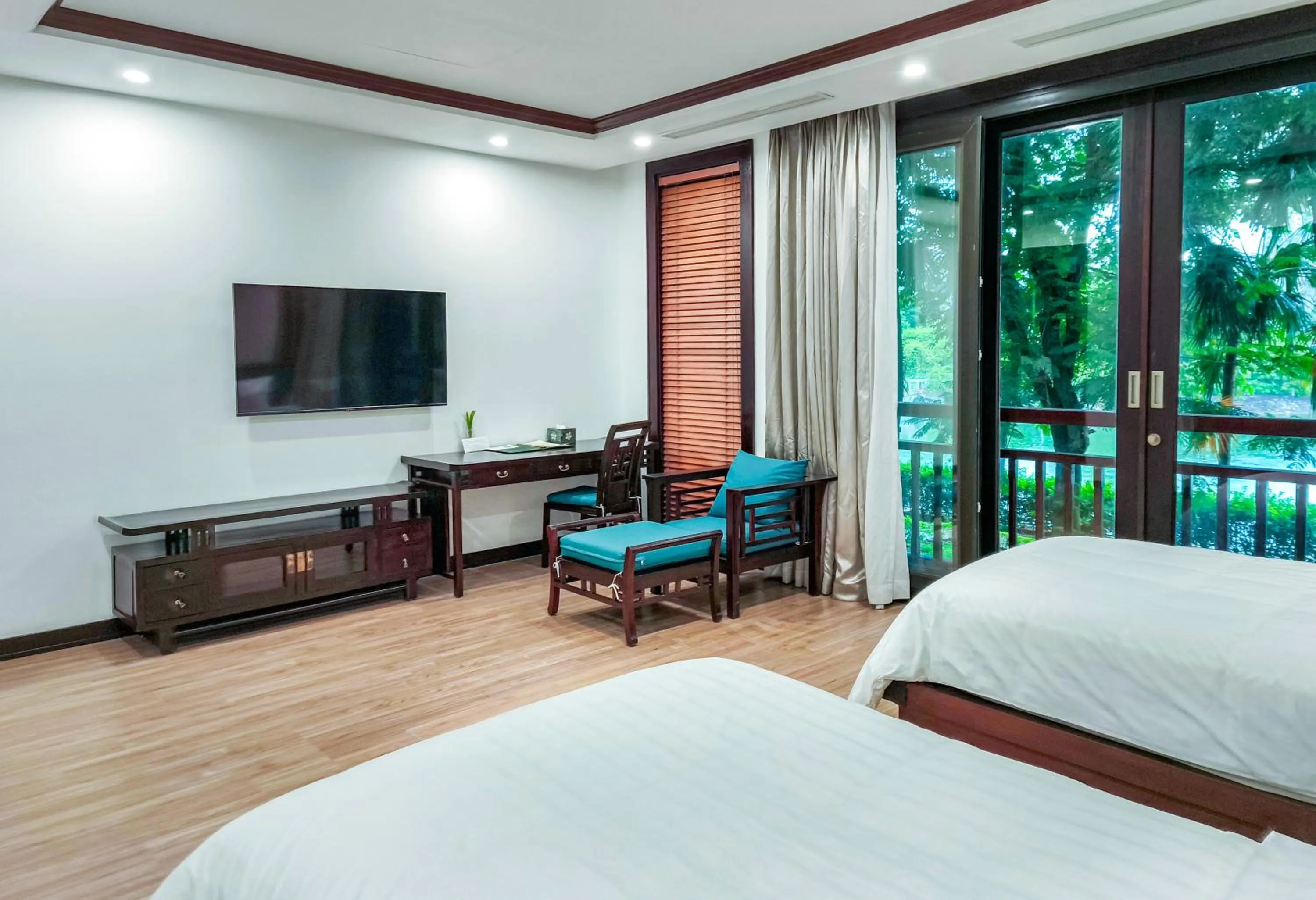 Bed in NCC Garden Villas - NCC Hotel