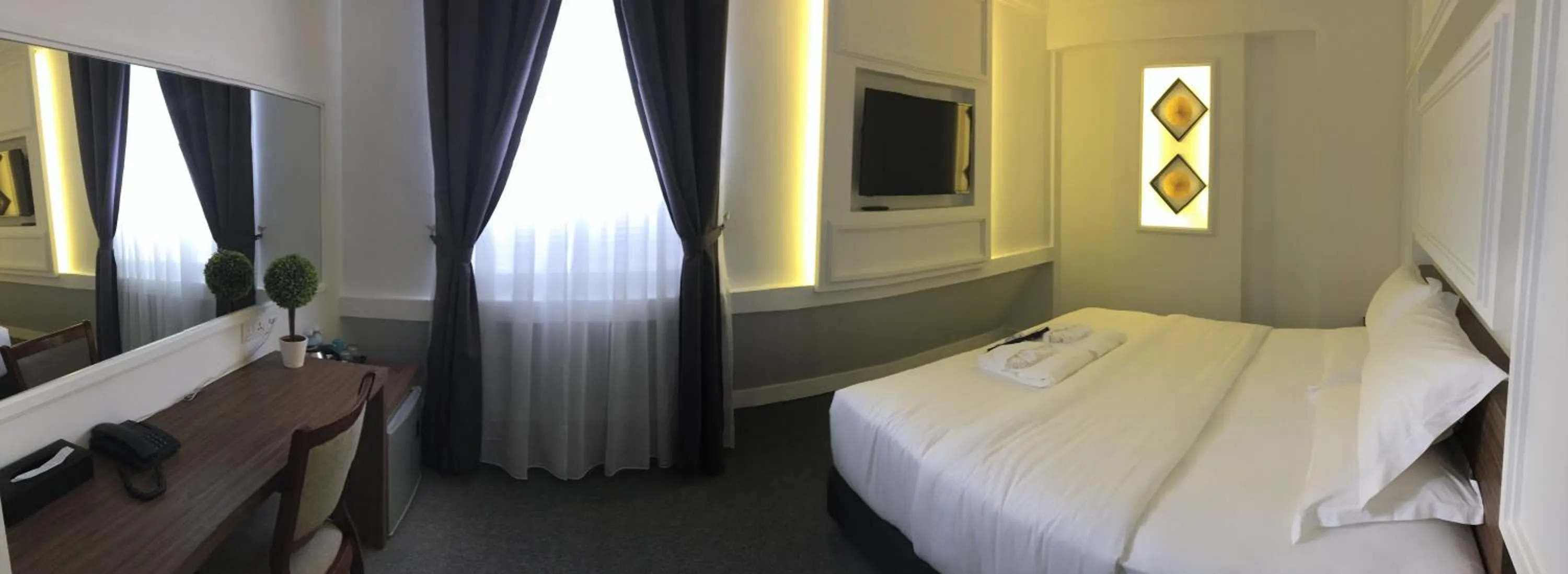 Bed in TheBlanc Boutique Hotel