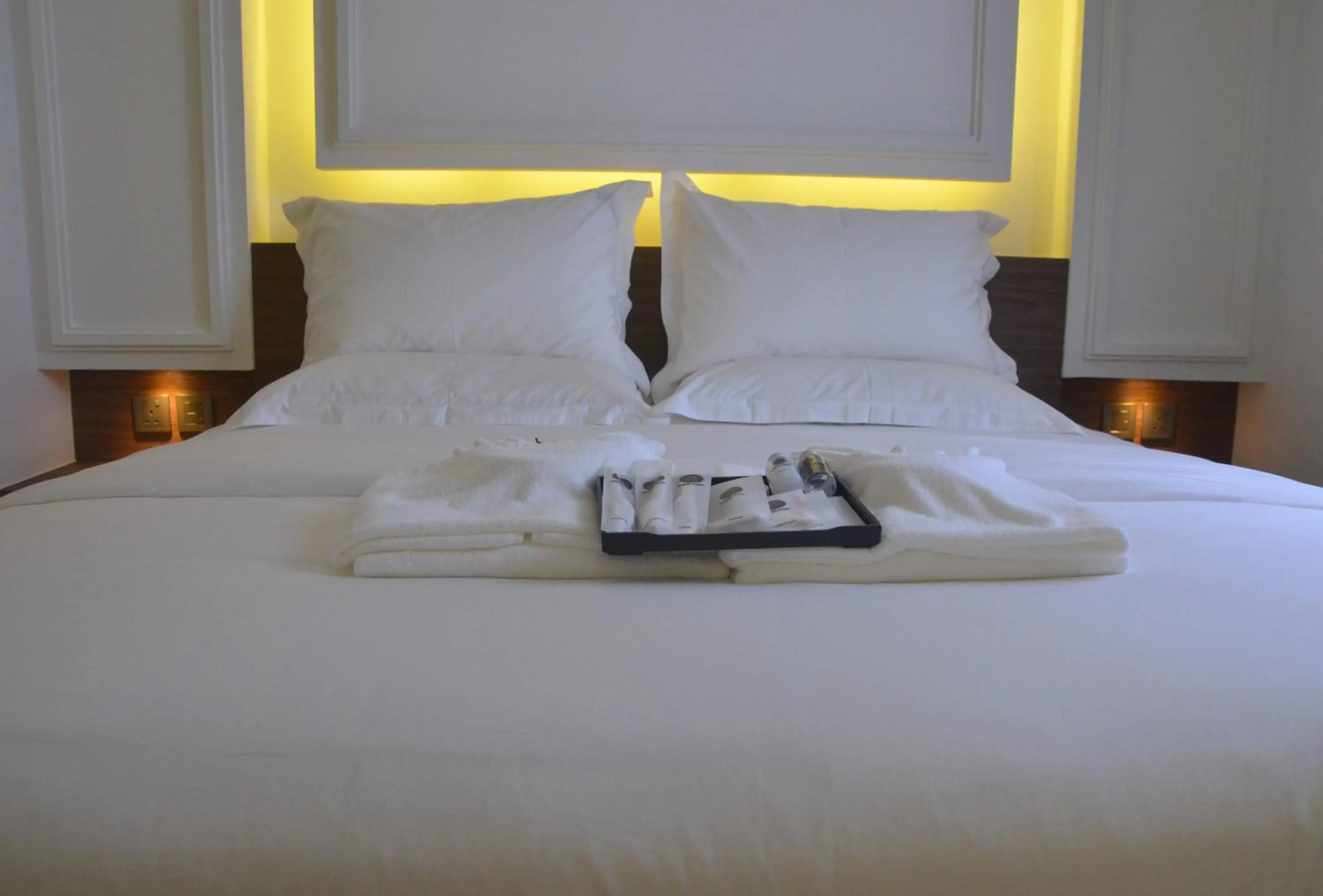 Bed in TheBlanc Boutique Hotel