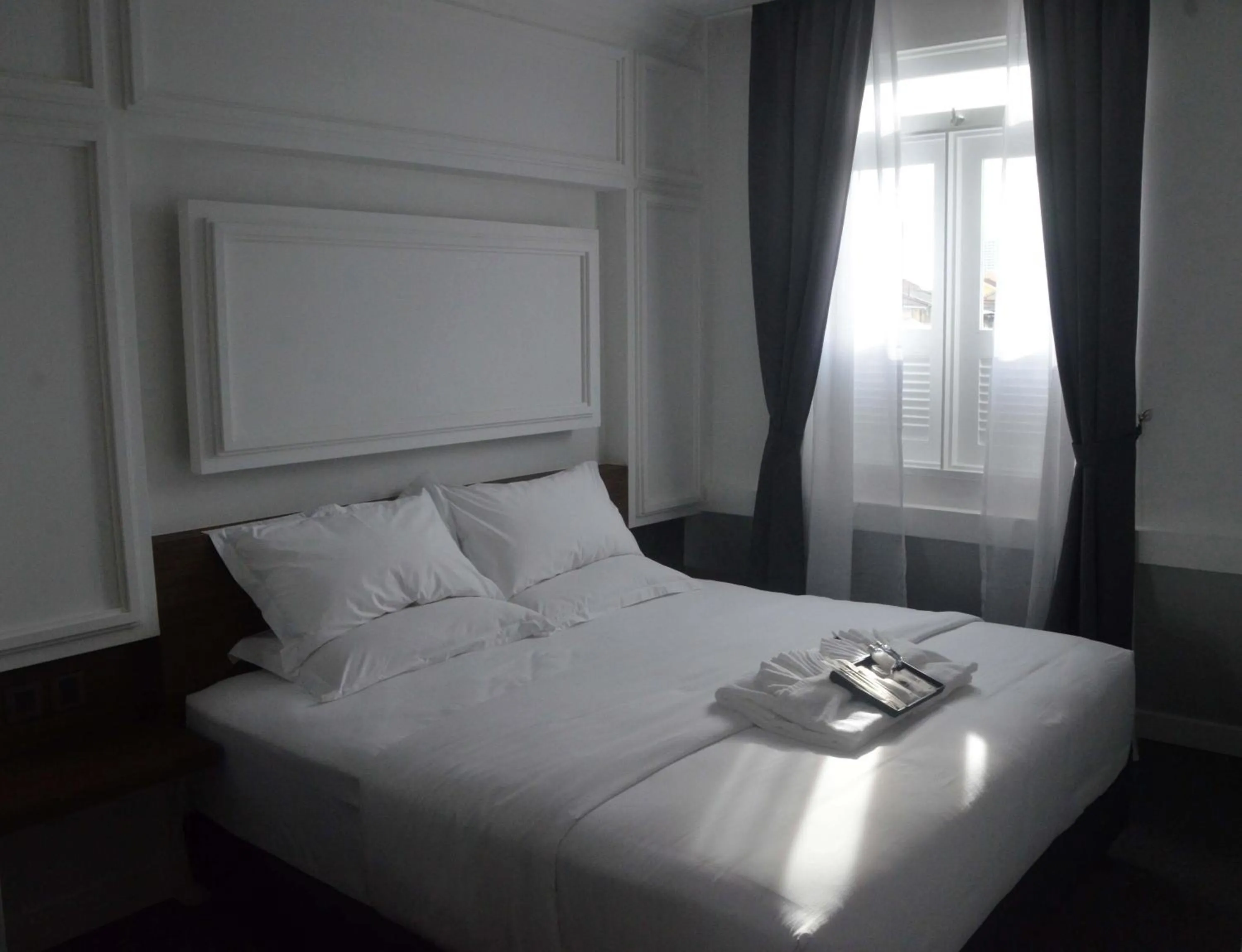 Bed in TheBlanc Boutique Hotel