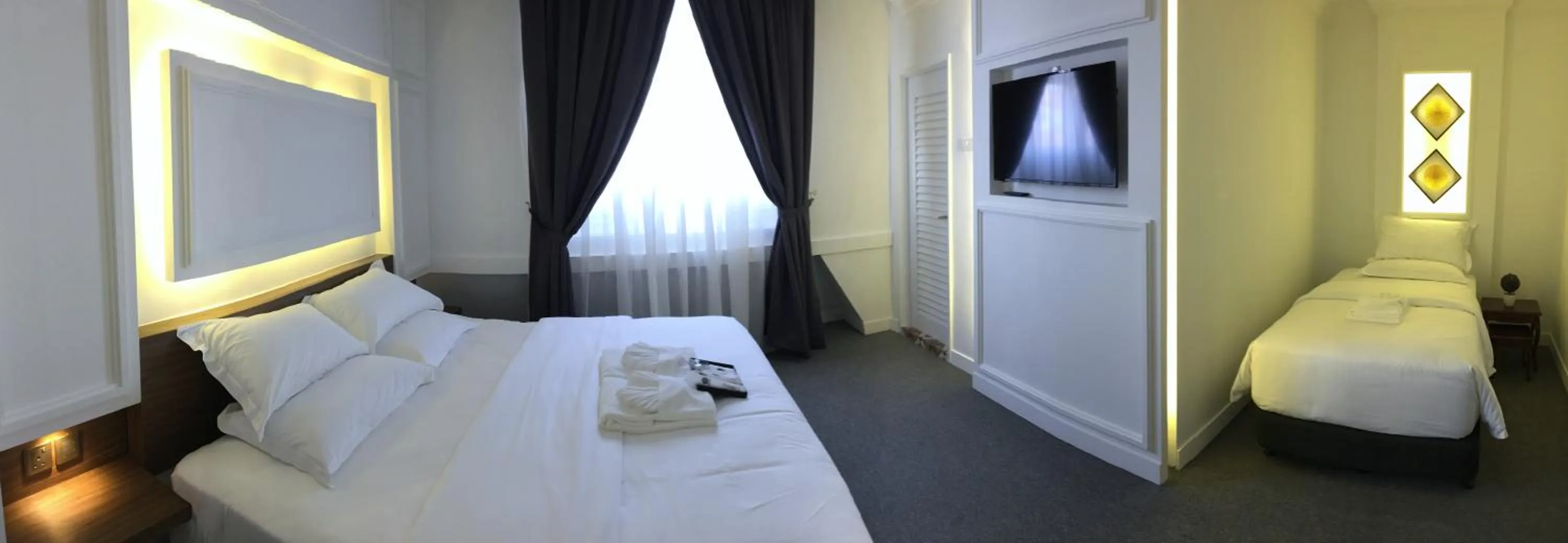 Bed in TheBlanc Boutique Hotel