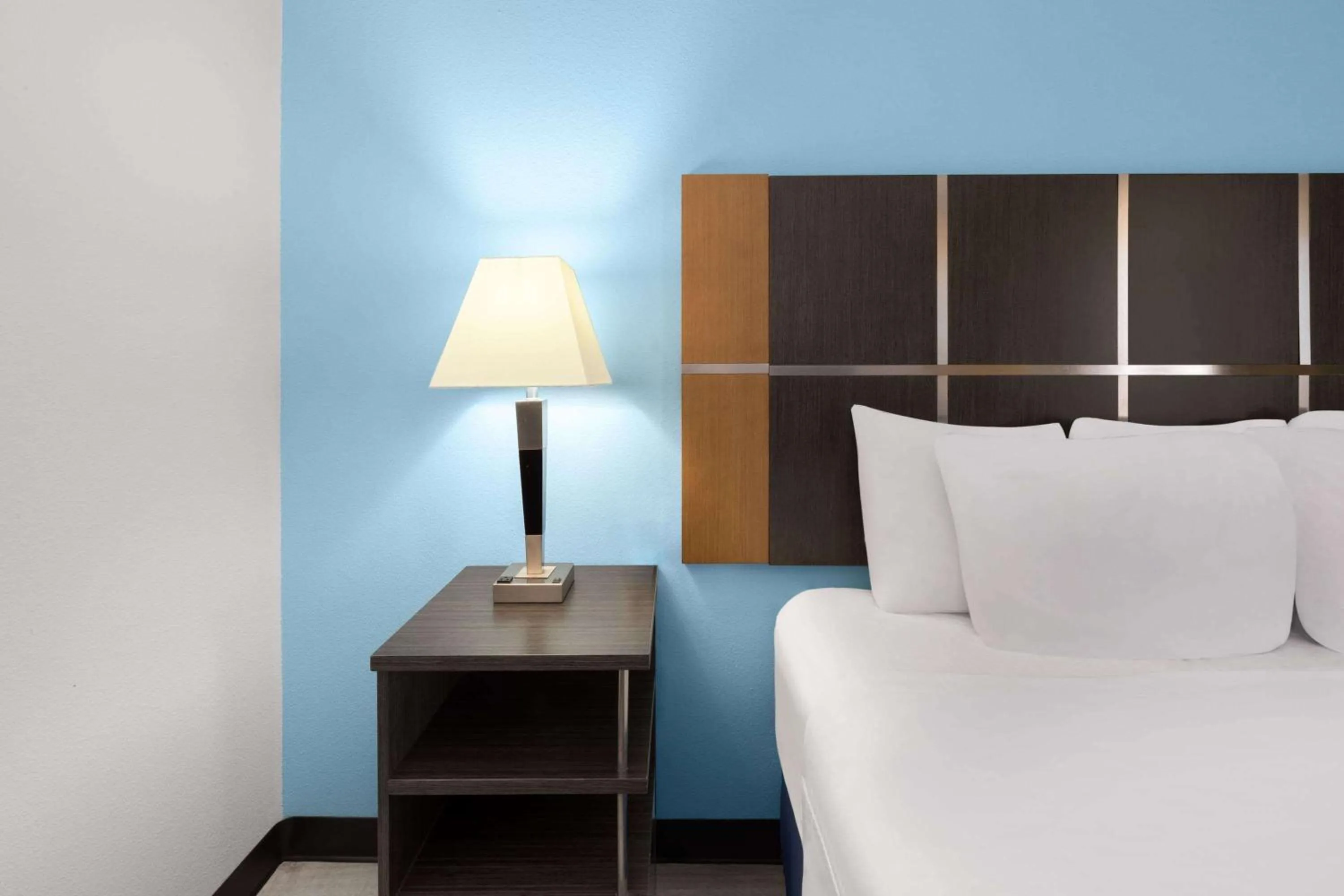 Photo of the whole room, Bed in Days Inn & Suites by Wyndham Lubbock Medical Center