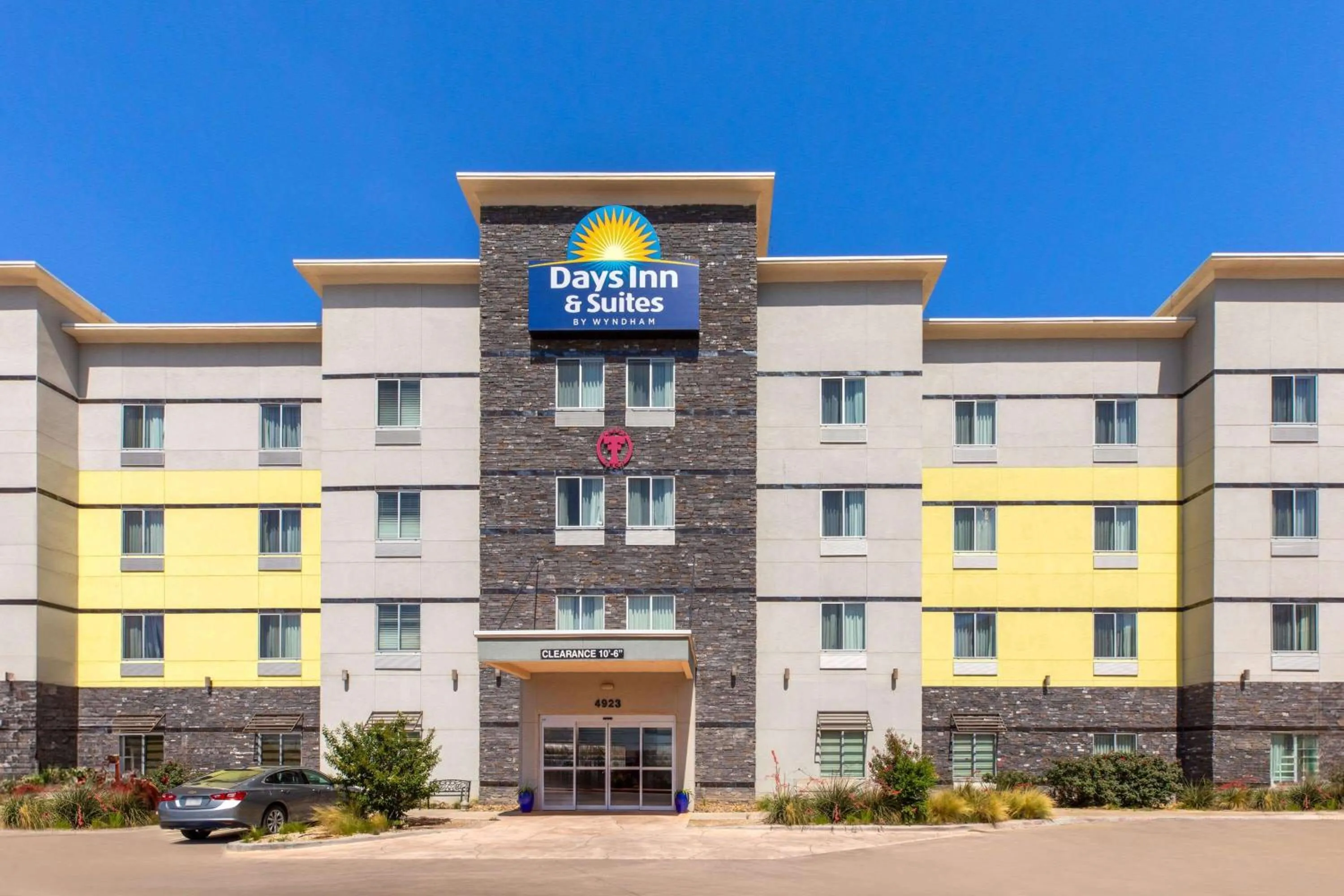 Property building in Days Inn & Suites by Wyndham Lubbock Medical Center