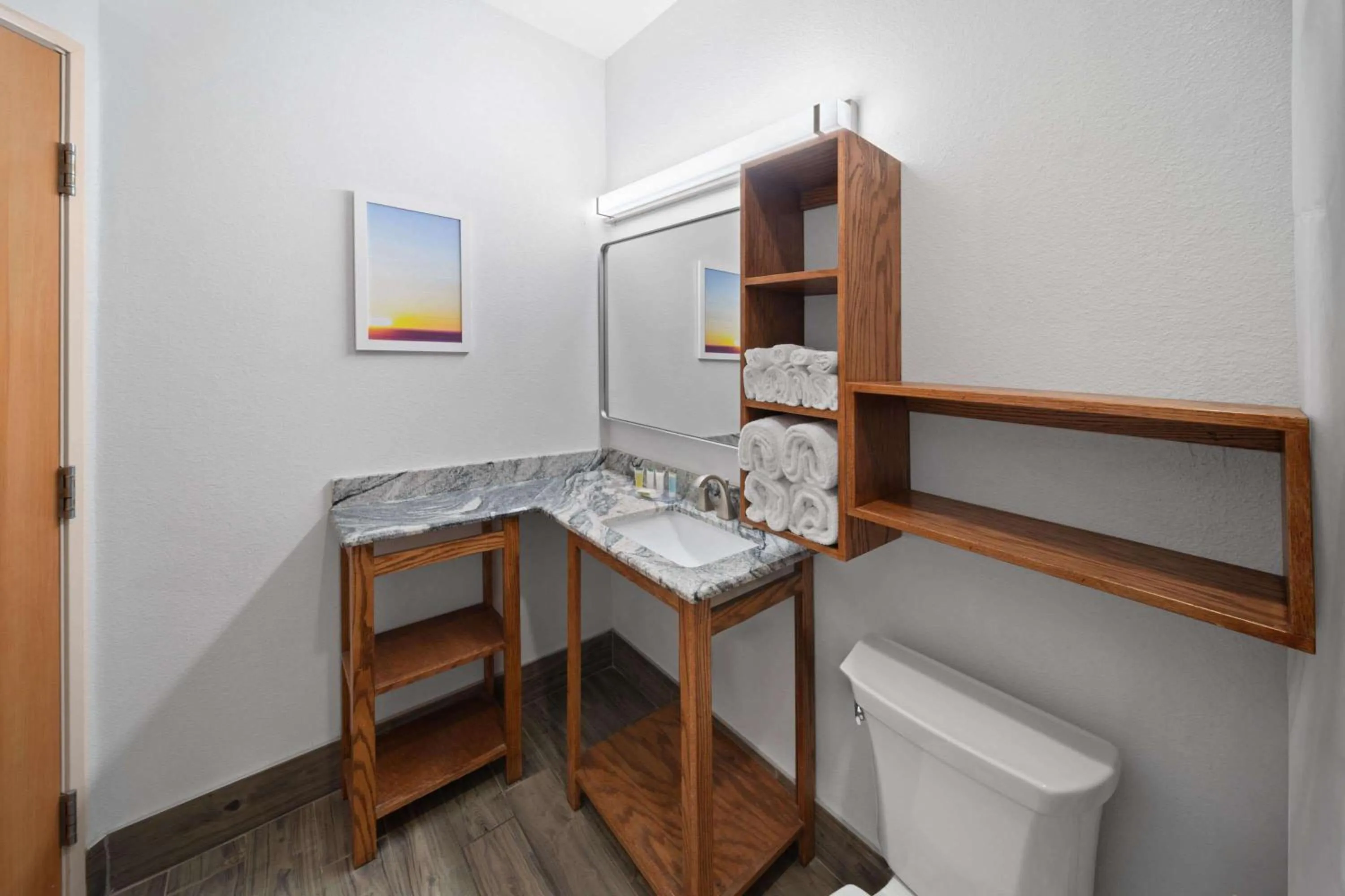 Bathroom in Days Inn & Suites by Wyndham Lubbock Medical Center