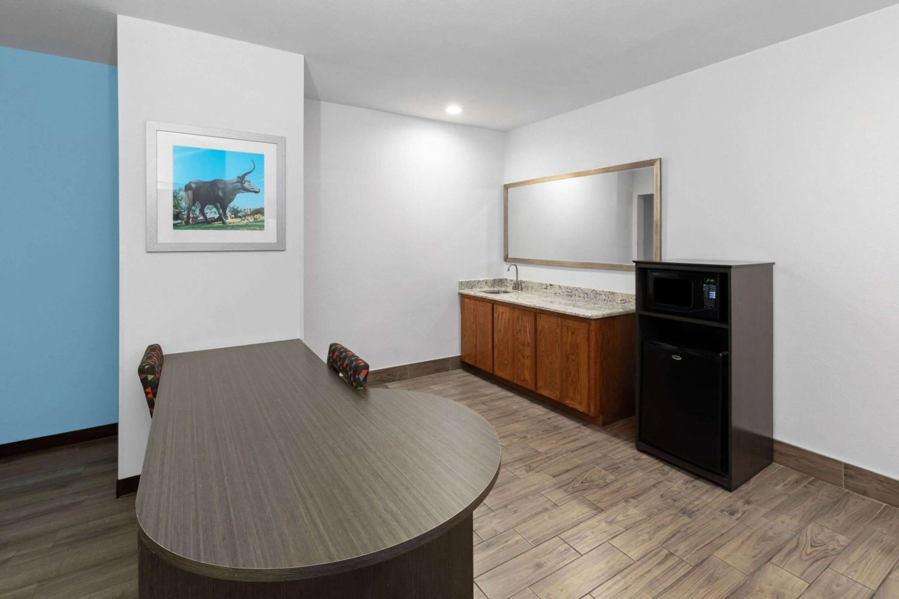 Photo of the whole room in Days Inn & Suites by Wyndham Lubbock Medical Center