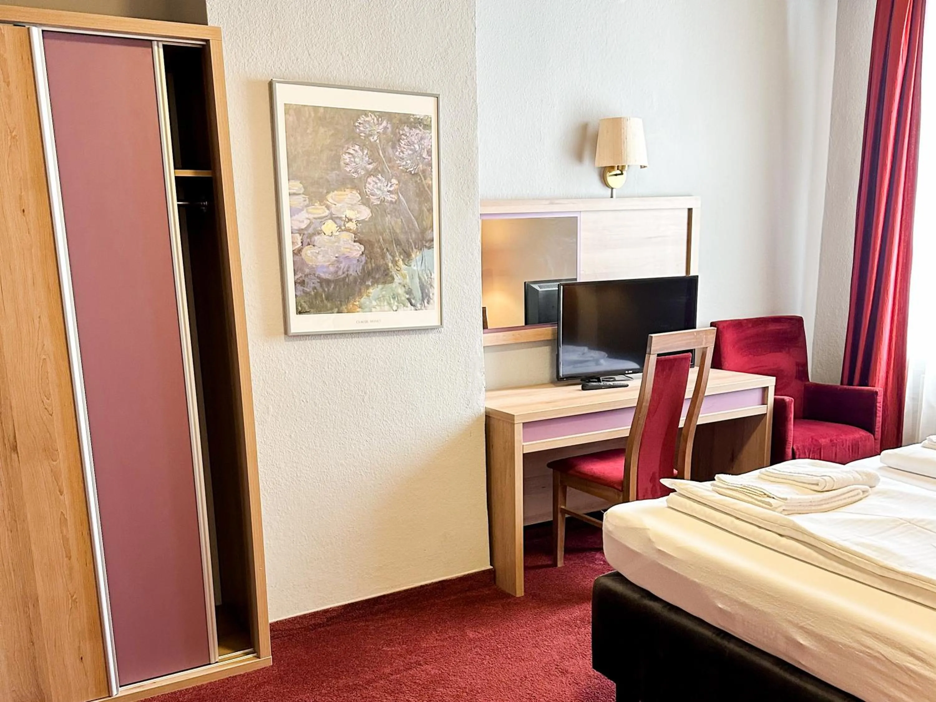 Bed in Hotel Fränkischer Hof