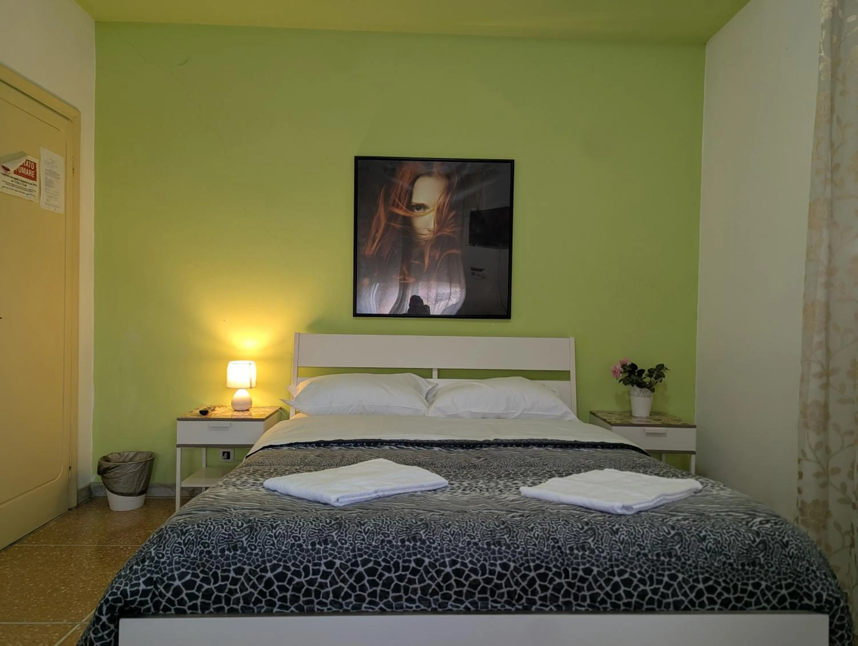 Bed in Pearl Pisa guest house