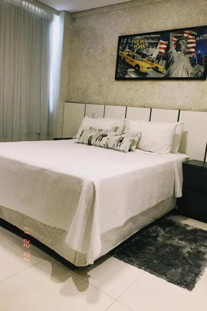 Bed in Pak Suítes Hotel