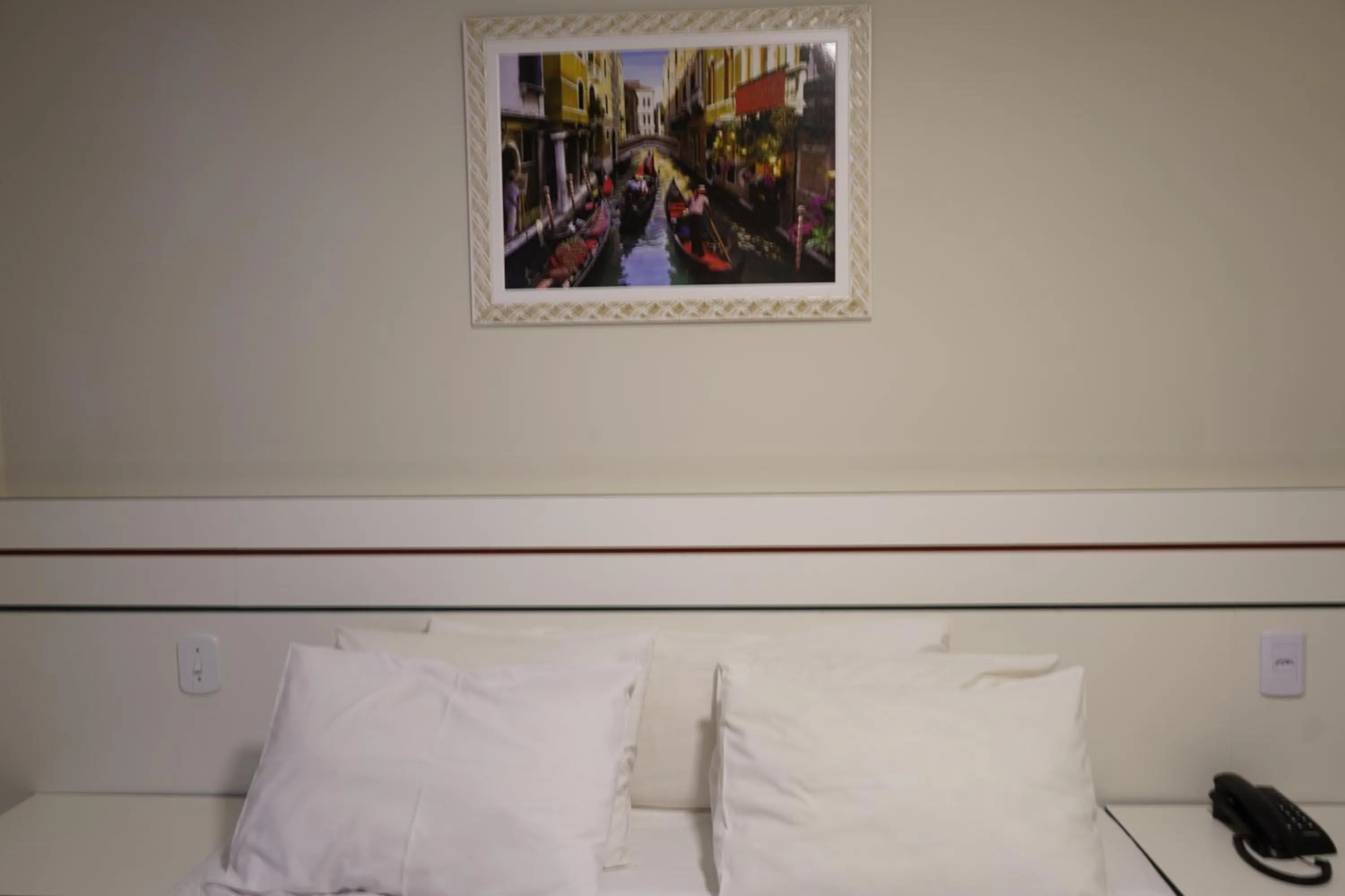 Bed in Pak Suítes Hotel