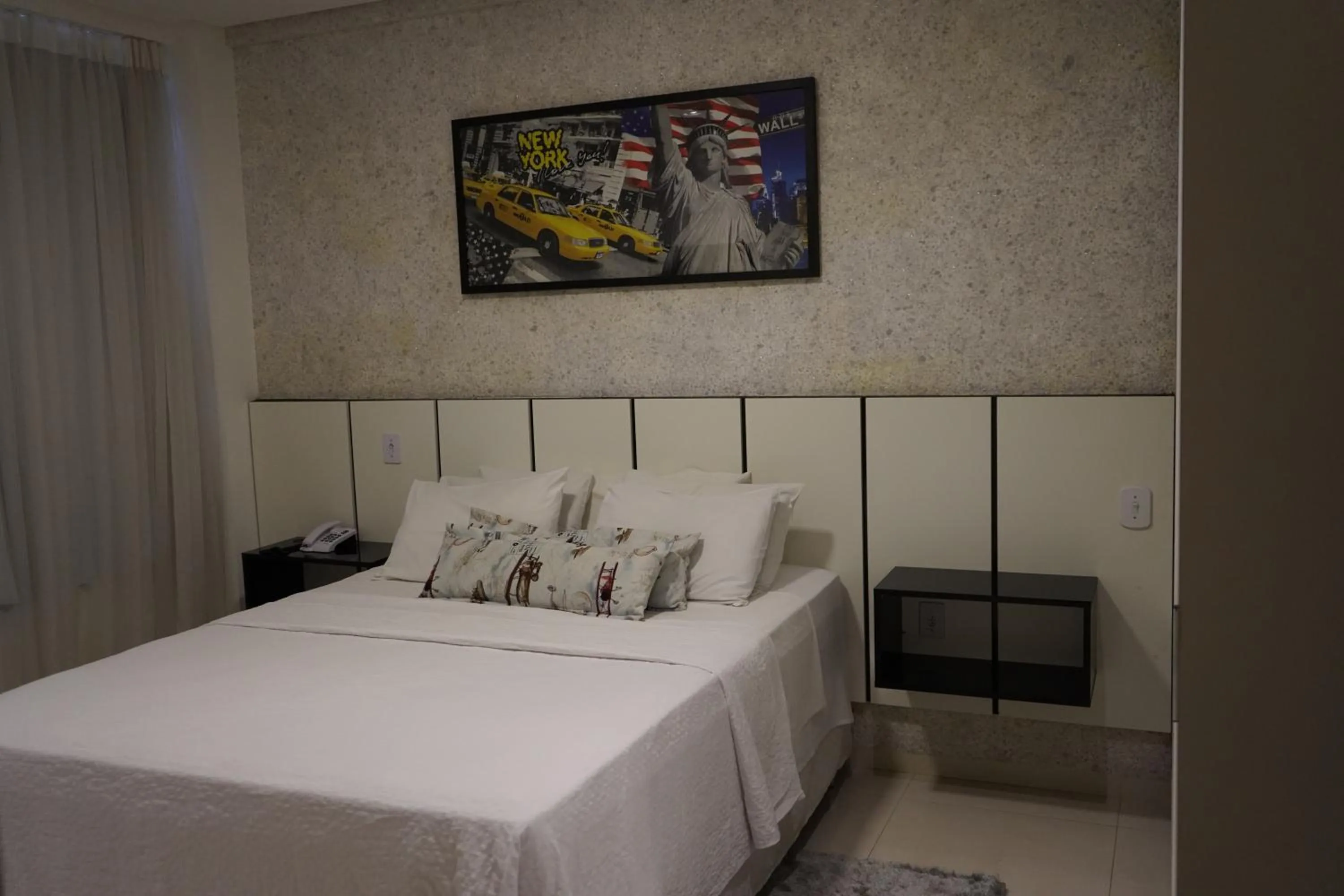 Bed in Pak Suítes Hotel