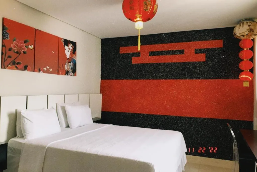 Bed in Pak Suítes Hotel