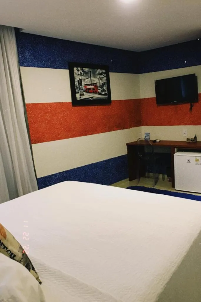Bed in Pak Suítes Hotel