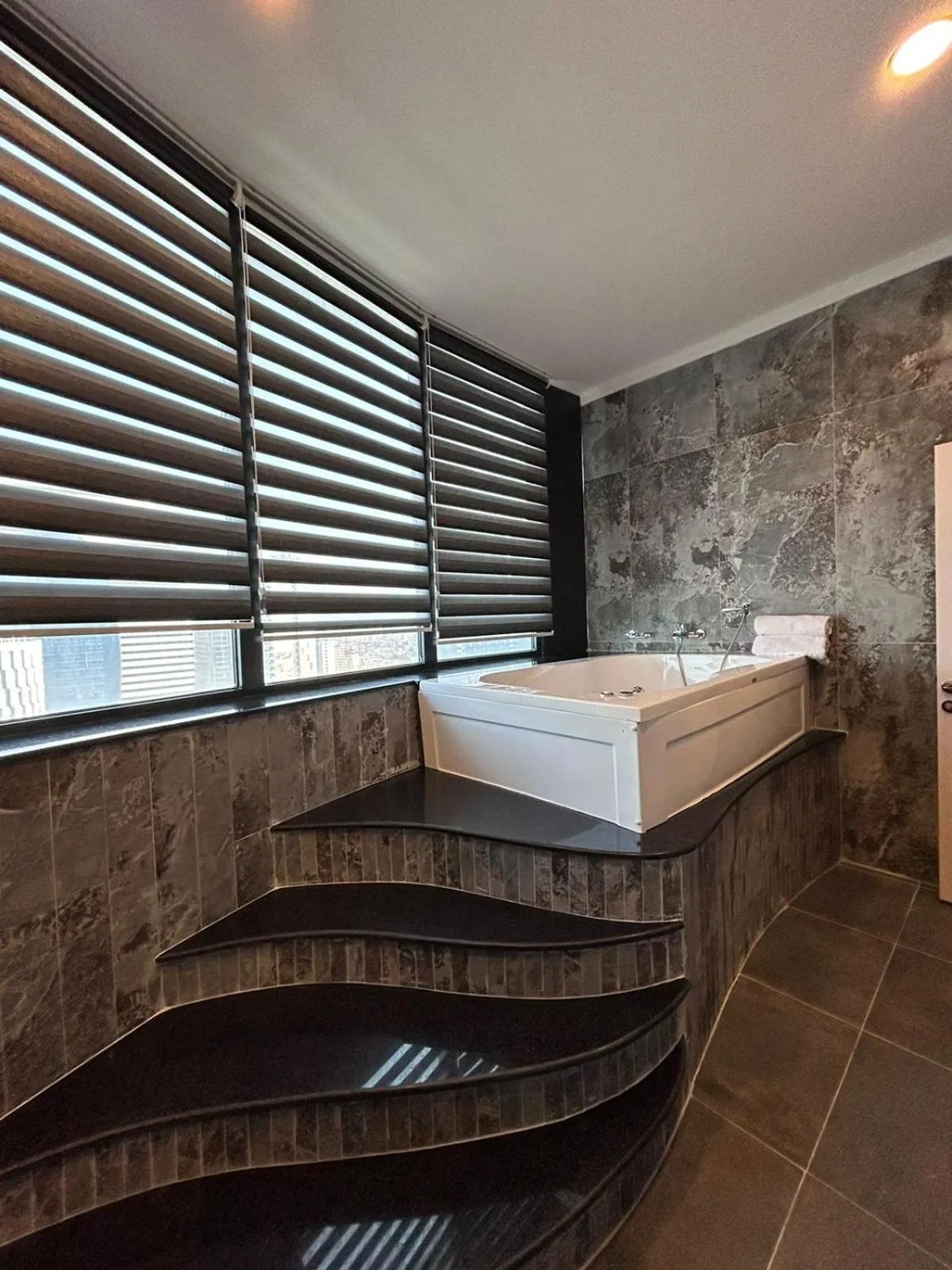 Bathroom, Bed in Sky Tower King Hotel