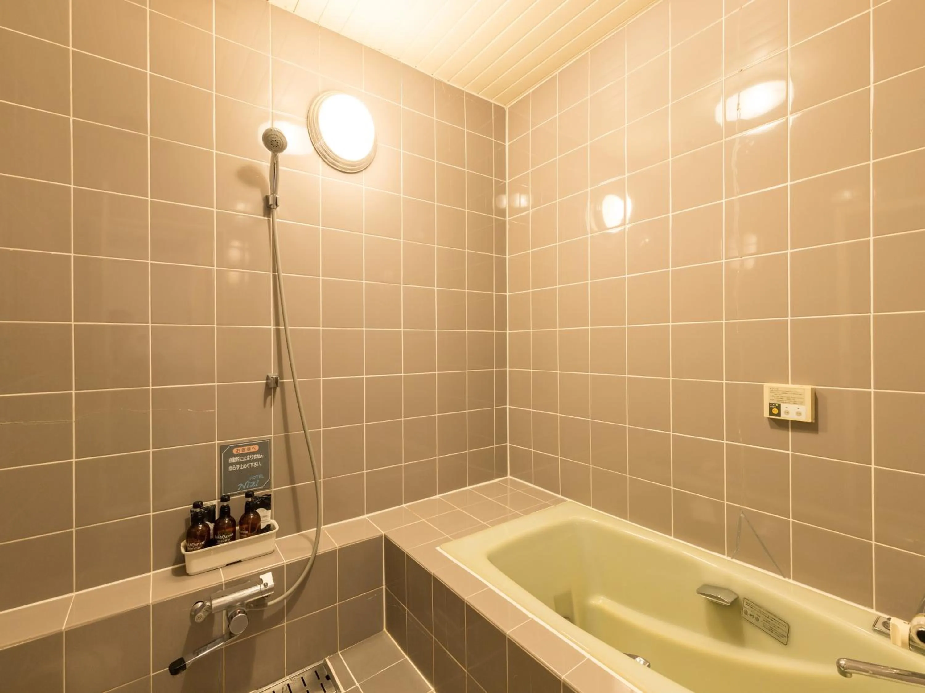 Bathroom in Tabist Hotel Nizi Fuefuki Misaka