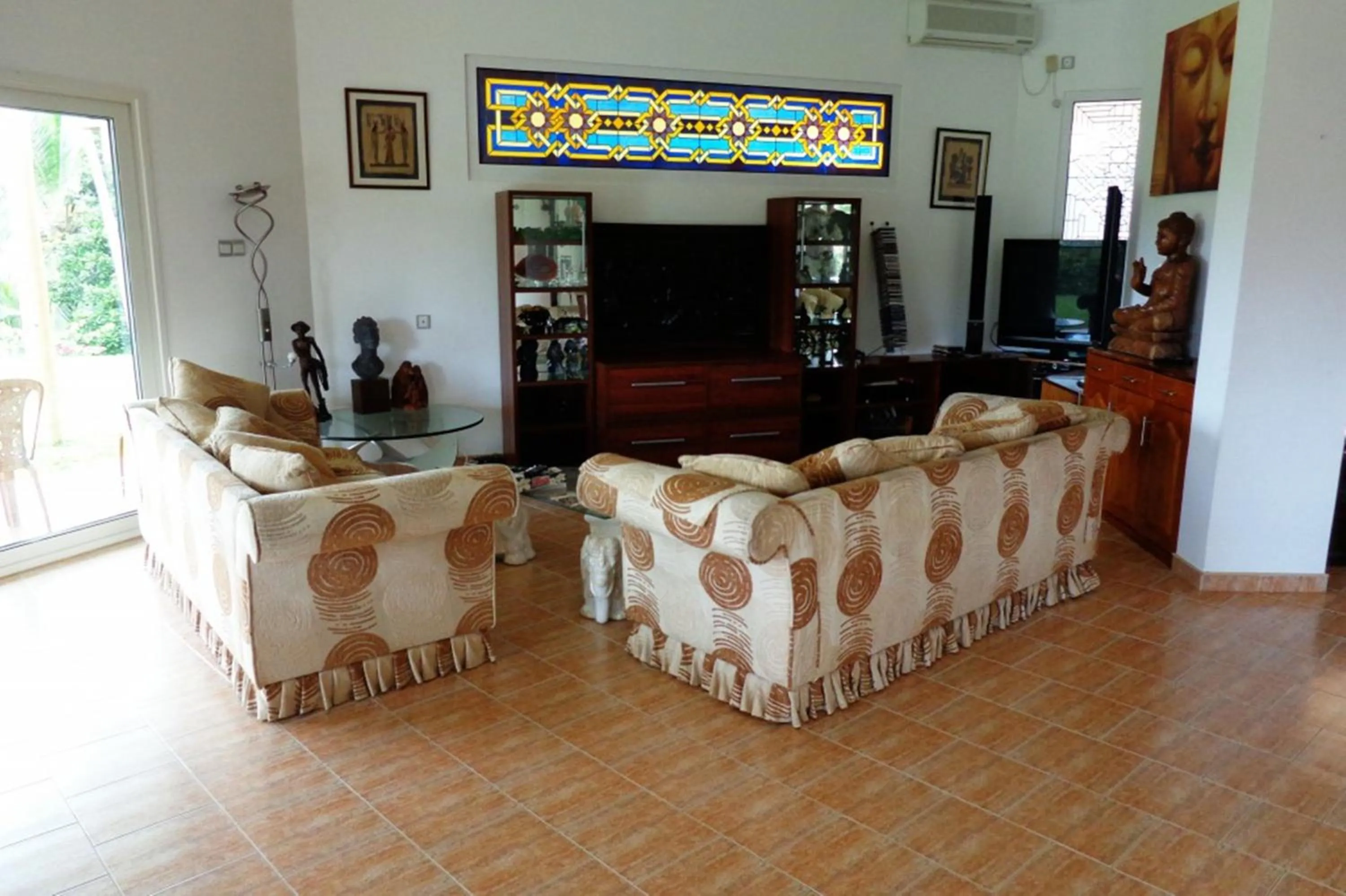 Communal lounge/ TV room in The Hilltop Boosa