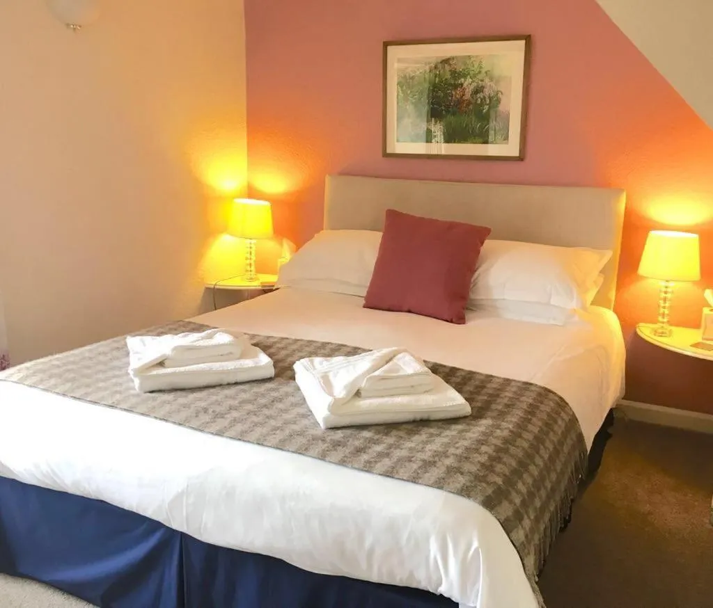 Bed in The Horseshoe Country Inn