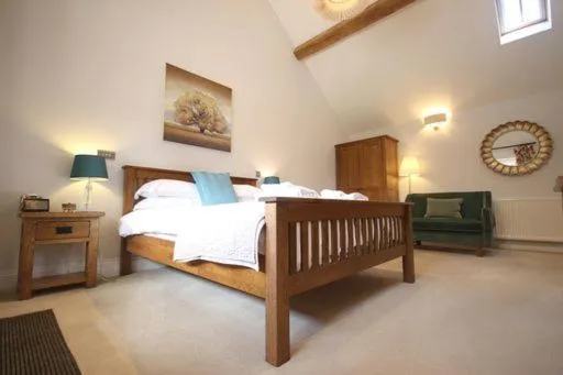 Bed in The Horseshoe Country Inn