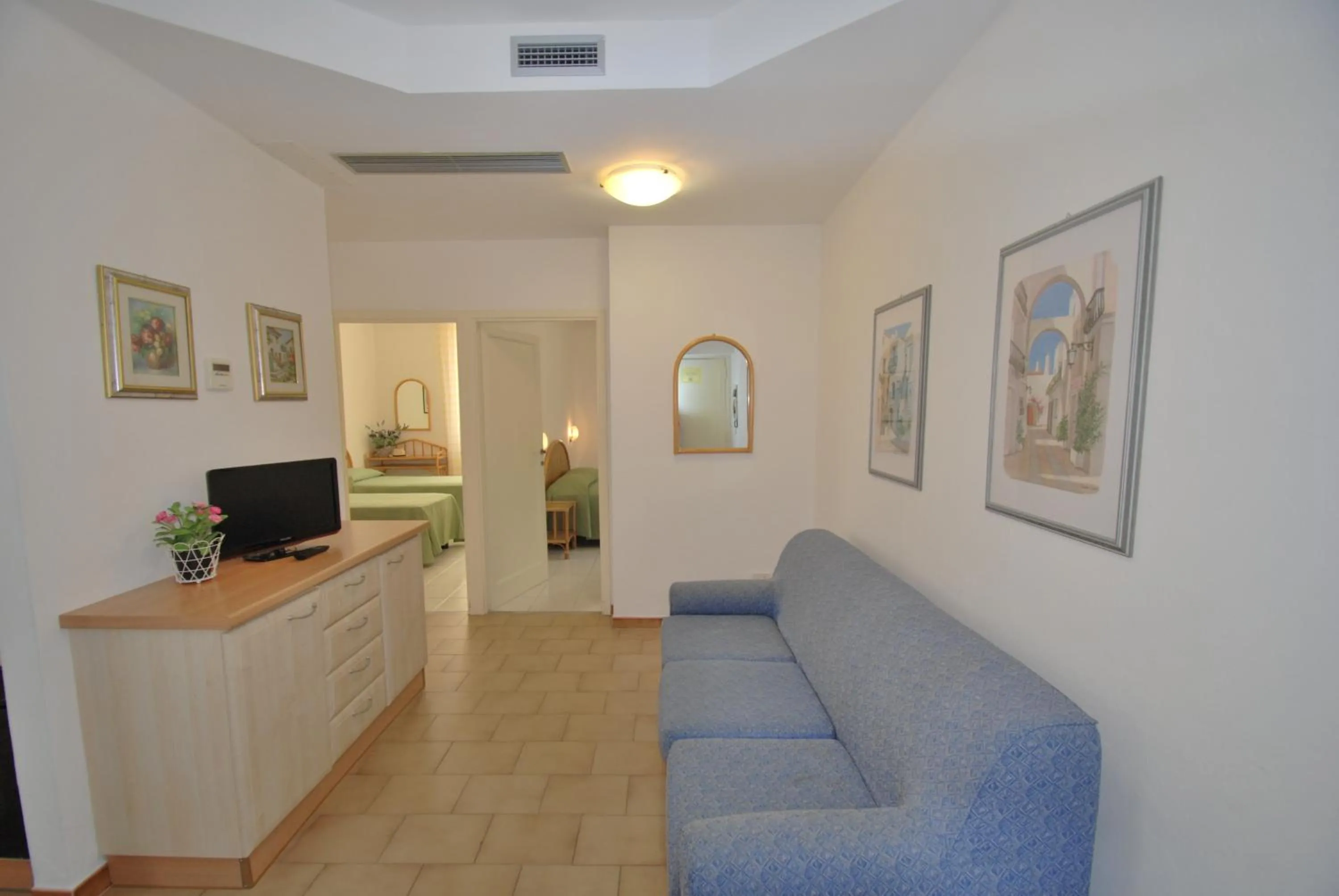 Kitchen or kitchenette in Appartamenti Olivo - 100 mt dal mare con aria condizionata