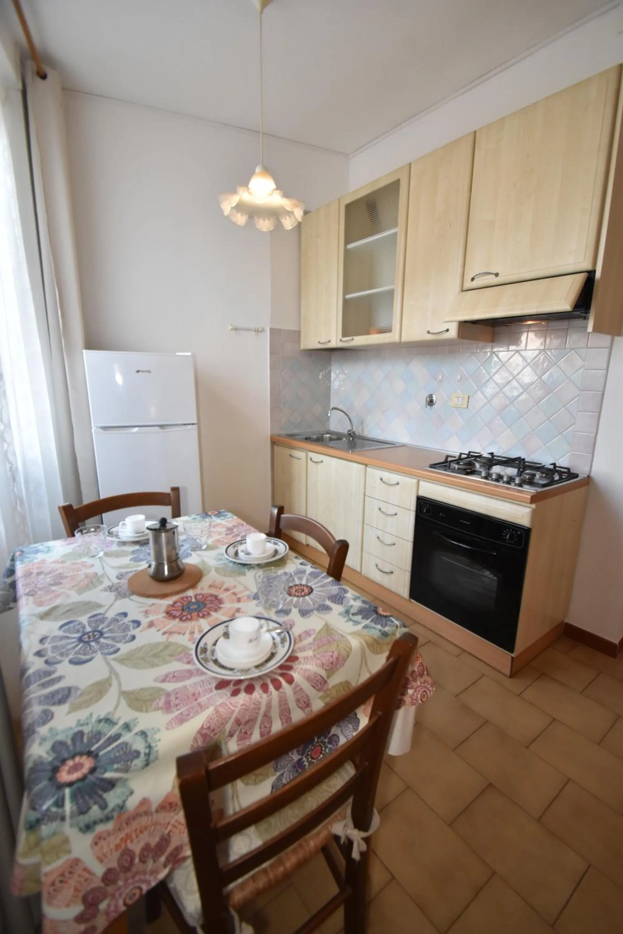 Kitchen or kitchenette in Appartamenti Olivo - 100 mt dal mare con aria condizionata