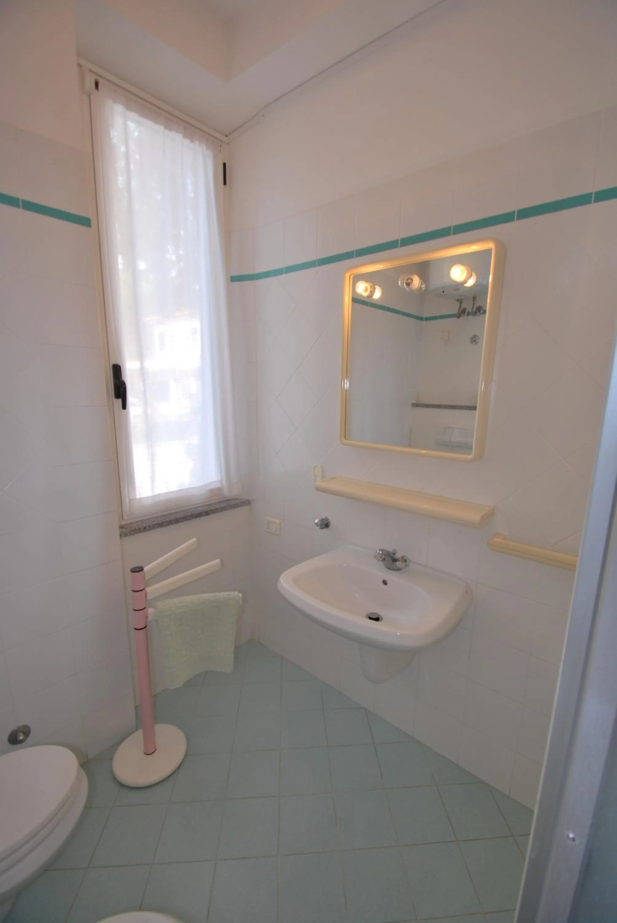 Bathroom in Appartamenti Olivo - 100 mt dal mare con aria condizionata