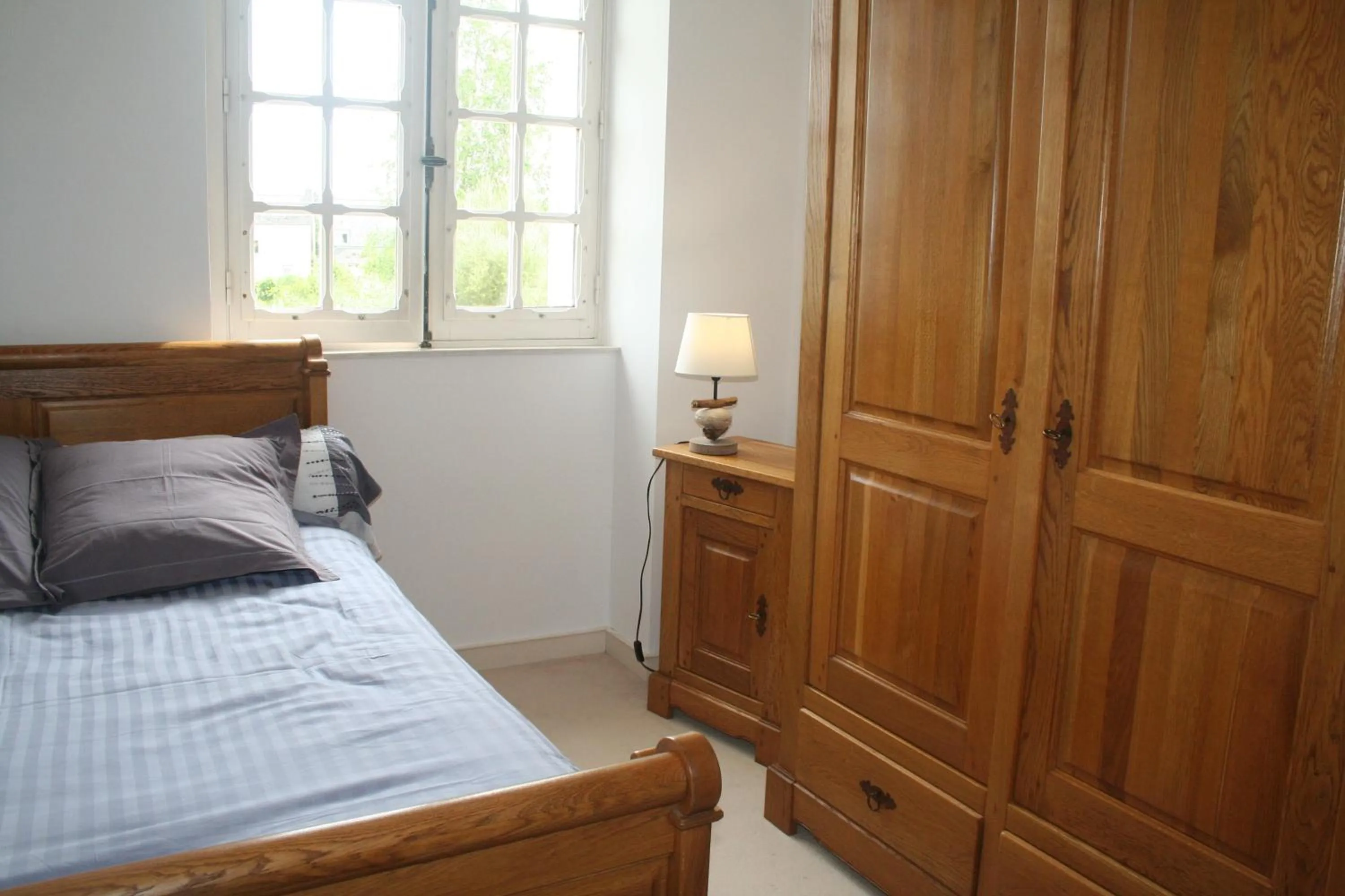 Bed in Chez Renée et Raynal B&B