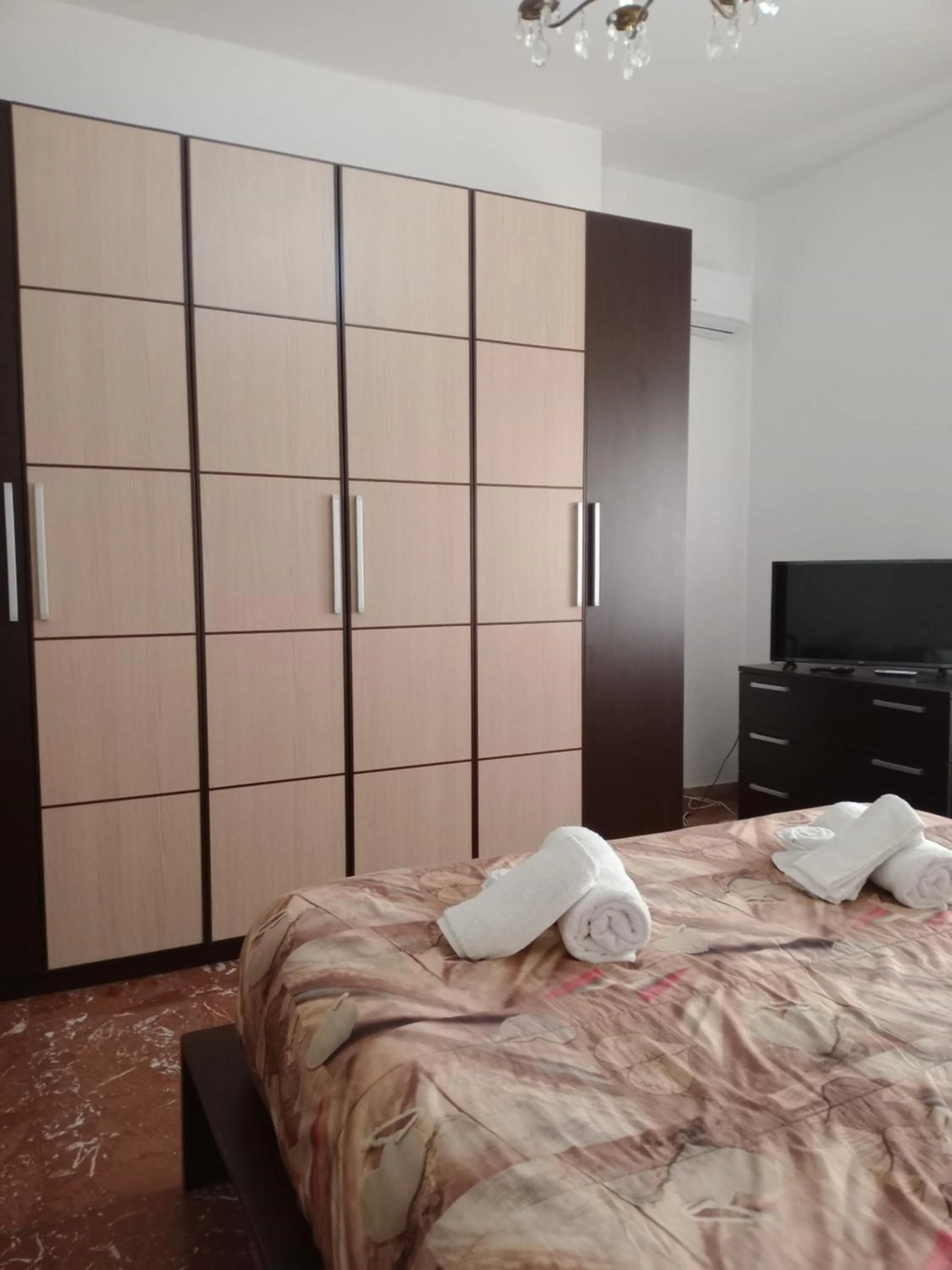 towels, Bed in B&B Lo Scrigno