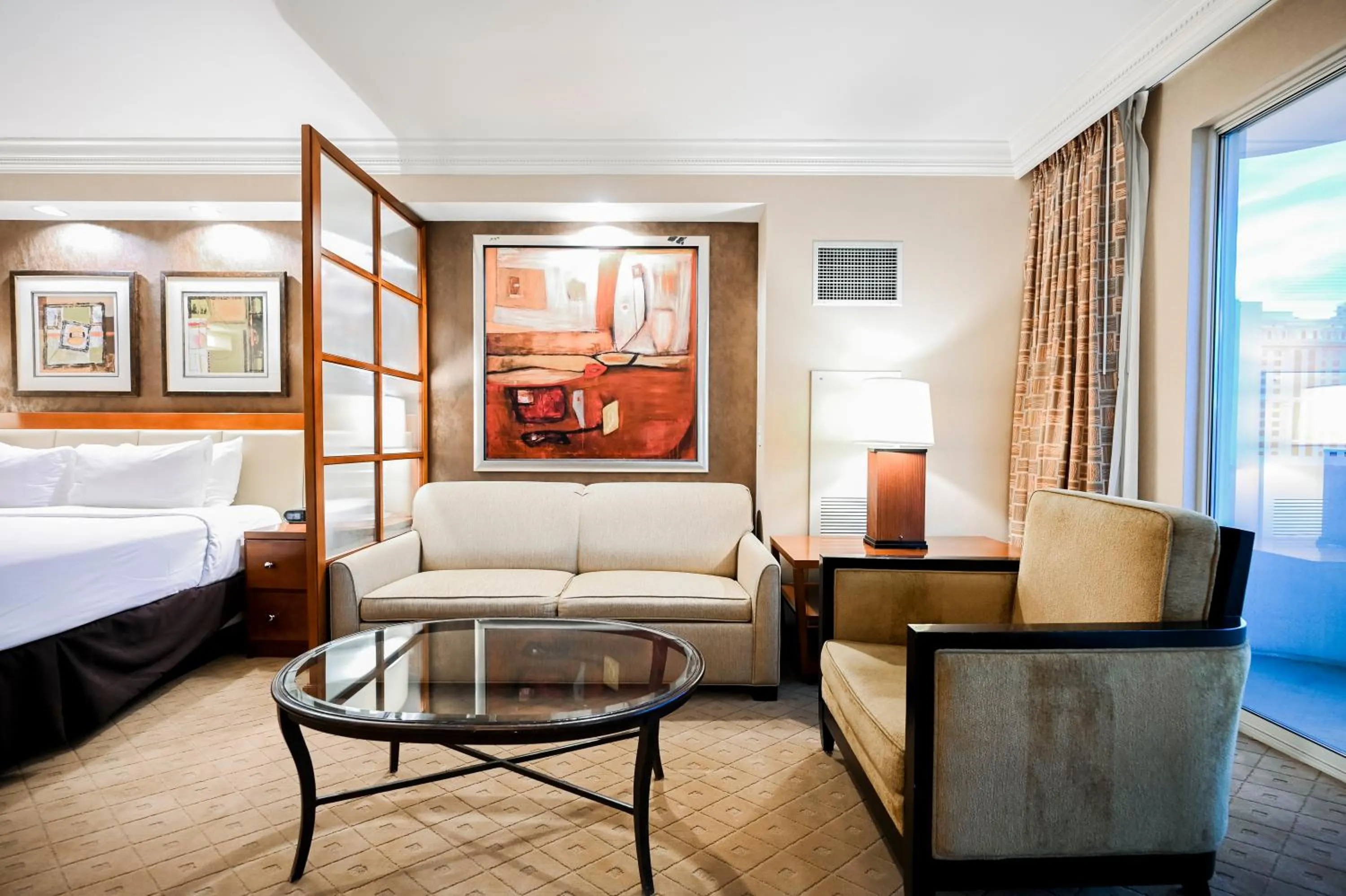 Living room, Bed in Signature Rental by Owner Direct