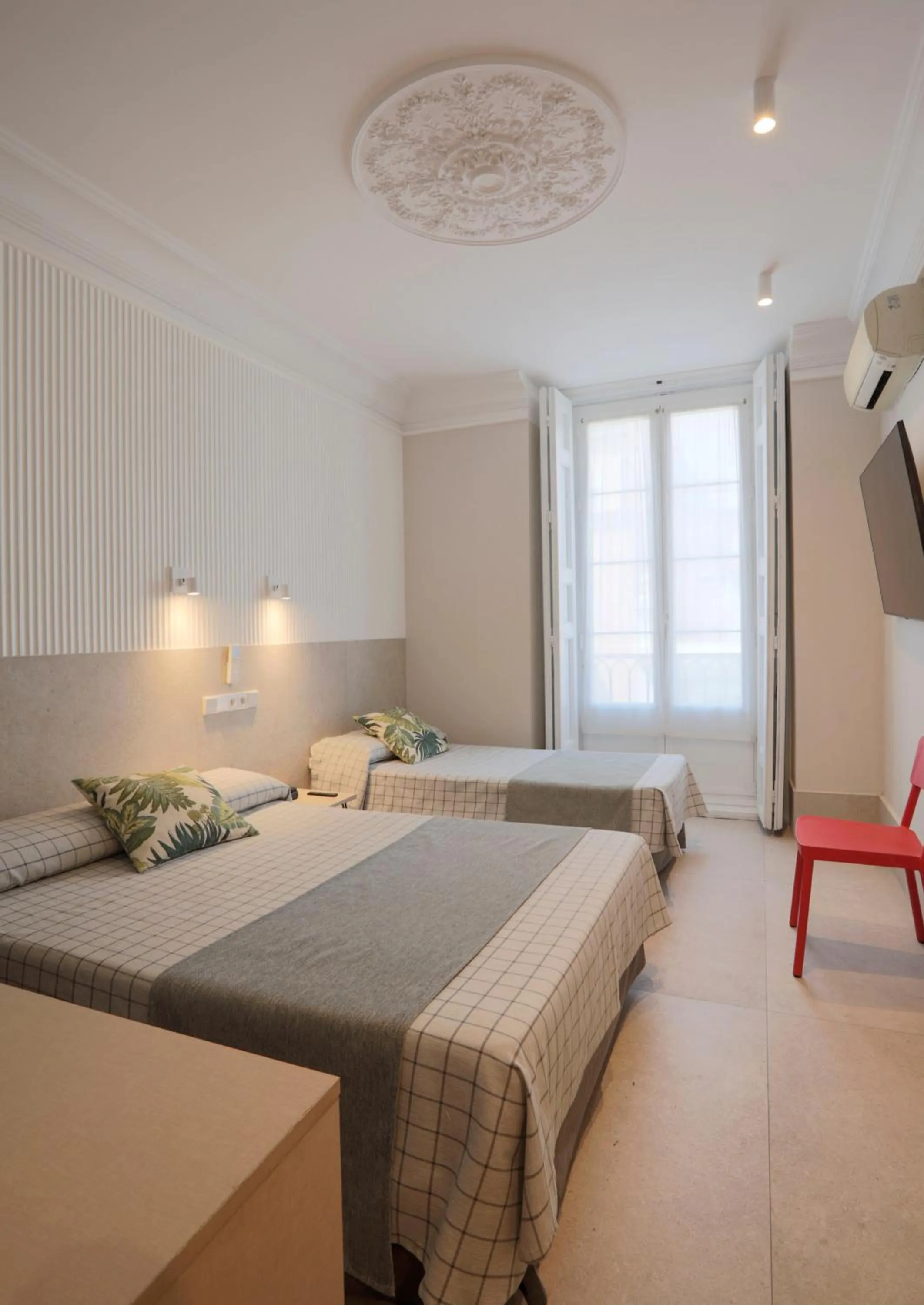 Bed in Hostal Castilla II Puerta del Sol