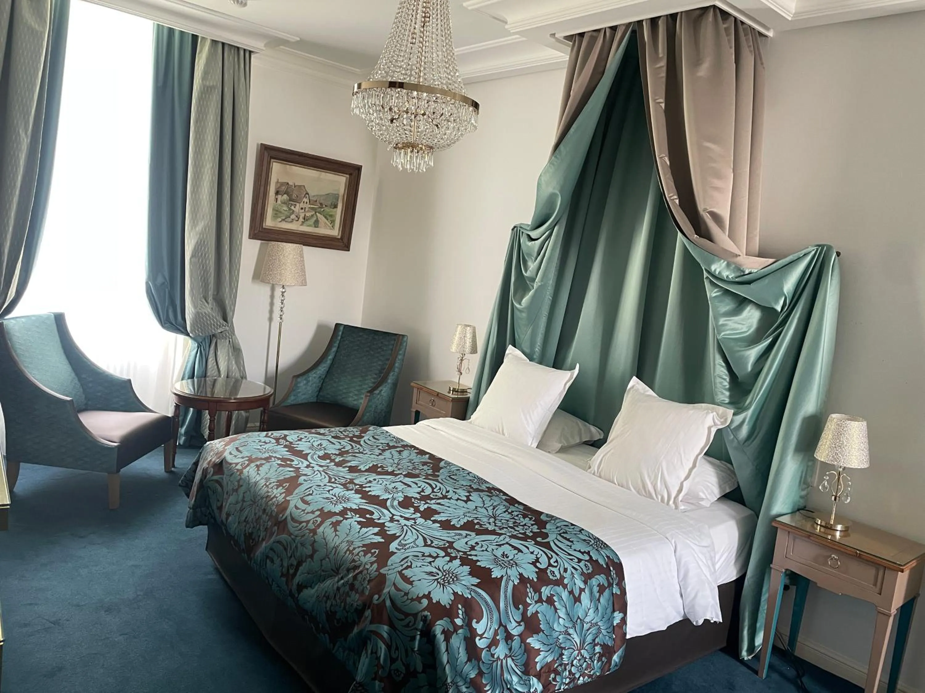 Bed in Hôtel Victor Hugo