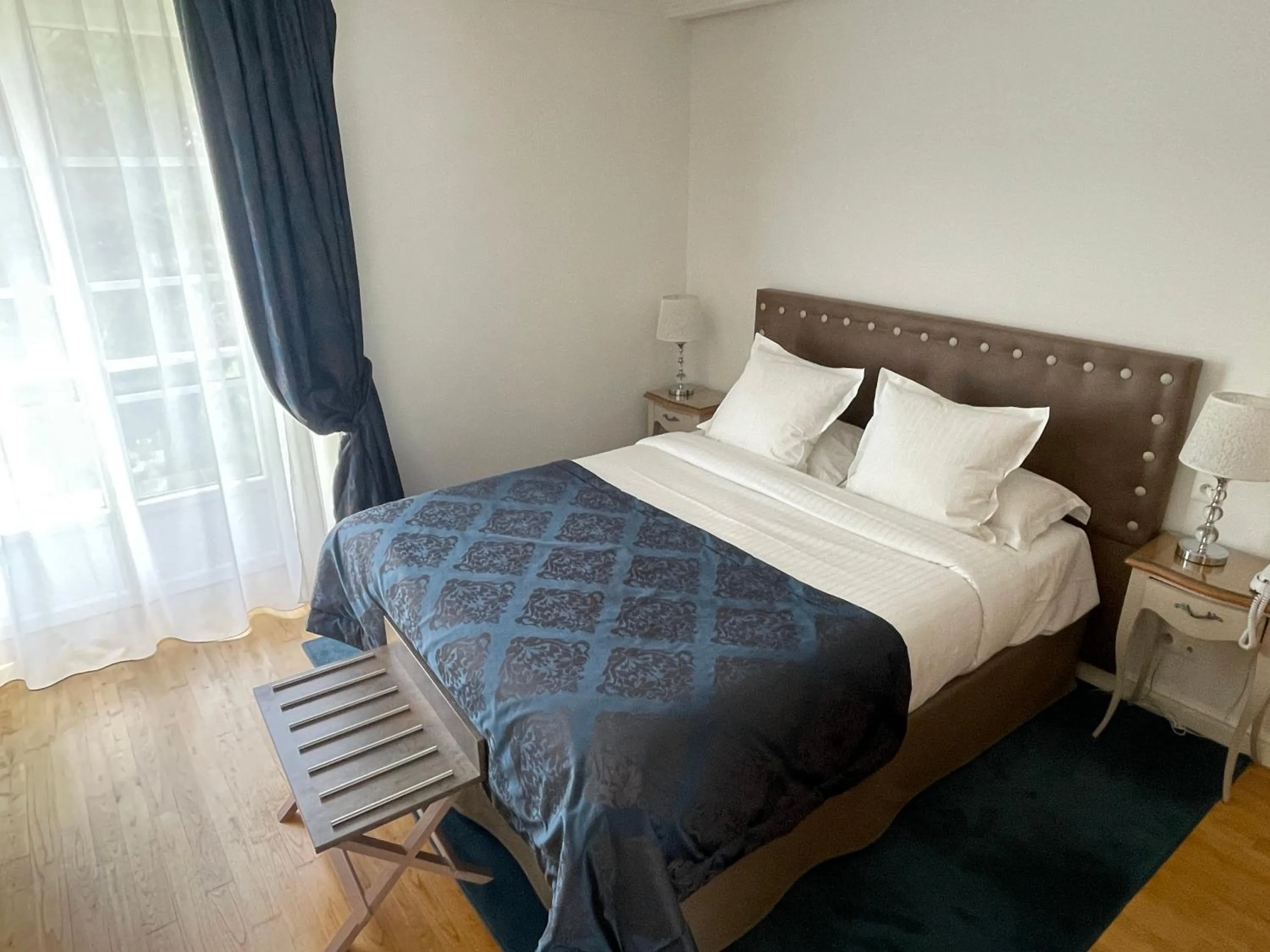 Bed in Hôtel Victor Hugo