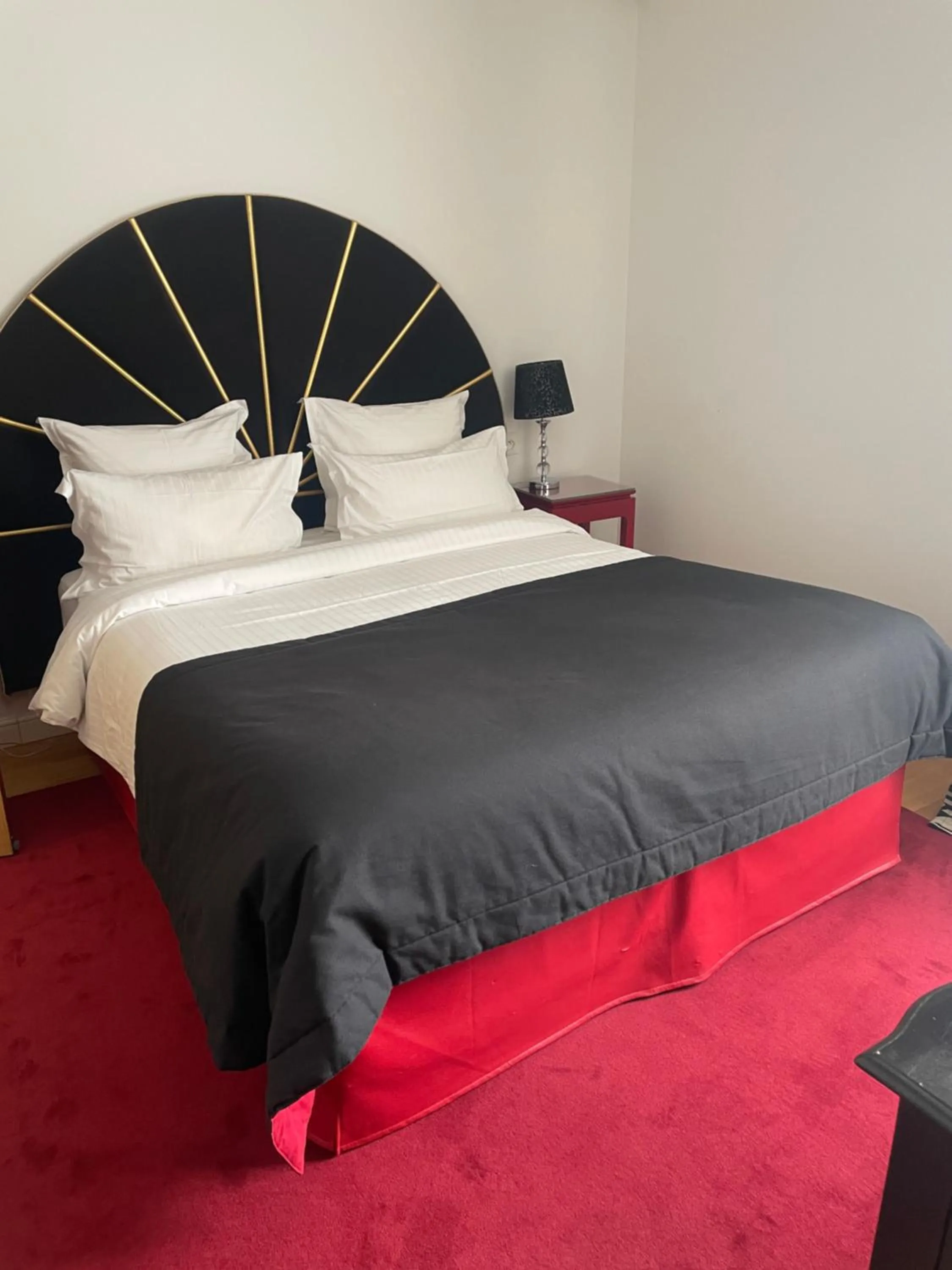 Bed in Hôtel Victor Hugo