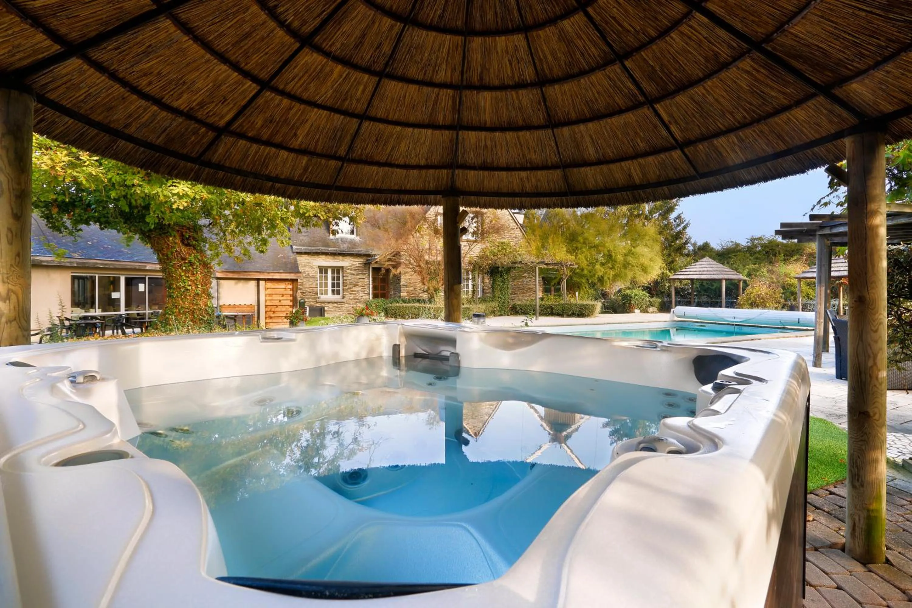 Patio in Logis Hôtel Domaine du Moulin Cavier - Restaurants & Spa