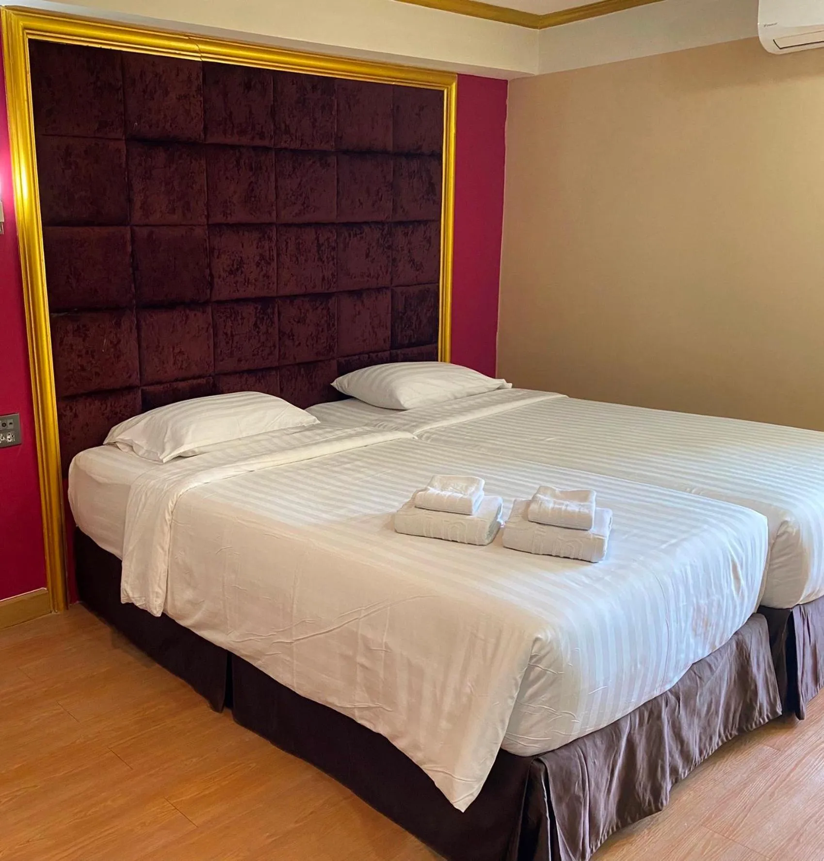 Bed in Grand Pink Hotel Hatyai
