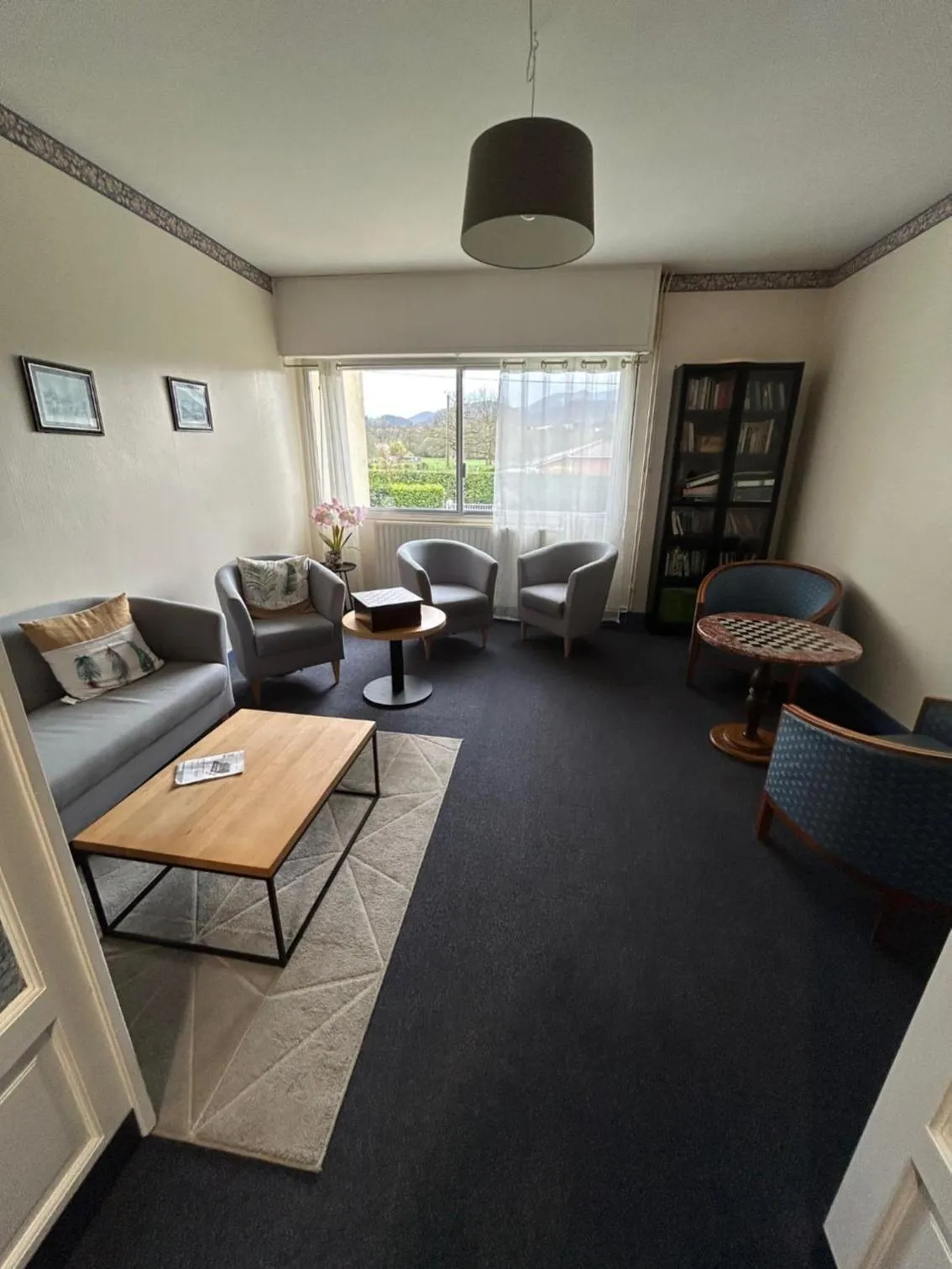 Seating area in Logis Hôtel restaurant Horizon 117