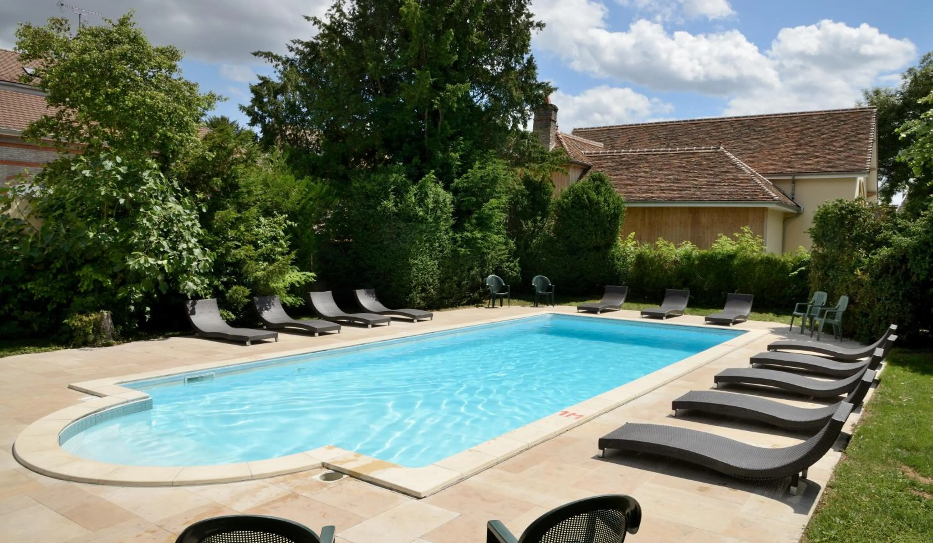 Swimming pool in Logis Le Tadorne