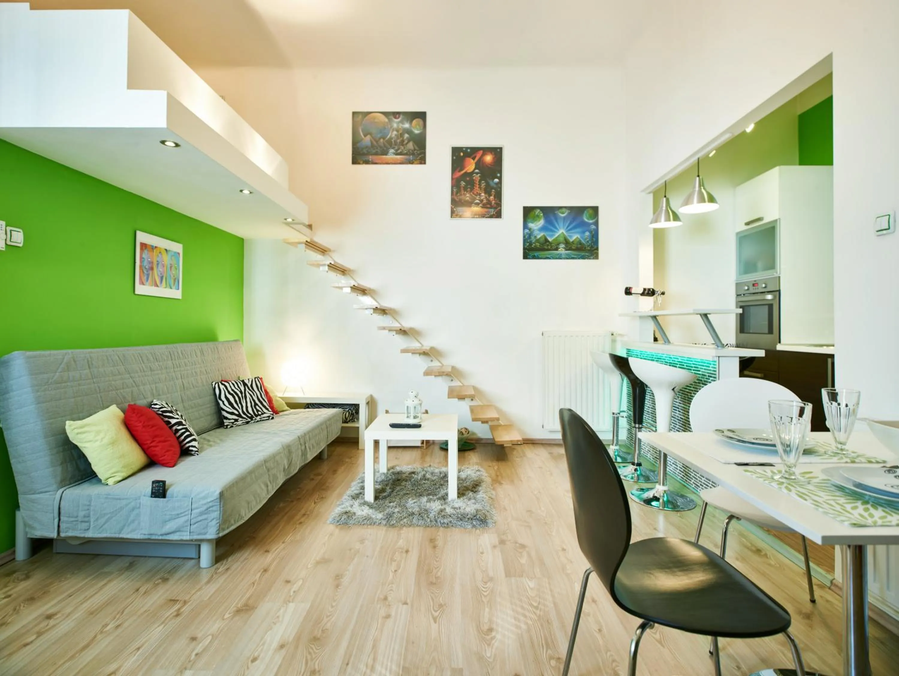 Living room in Studio Apartment Green Wall