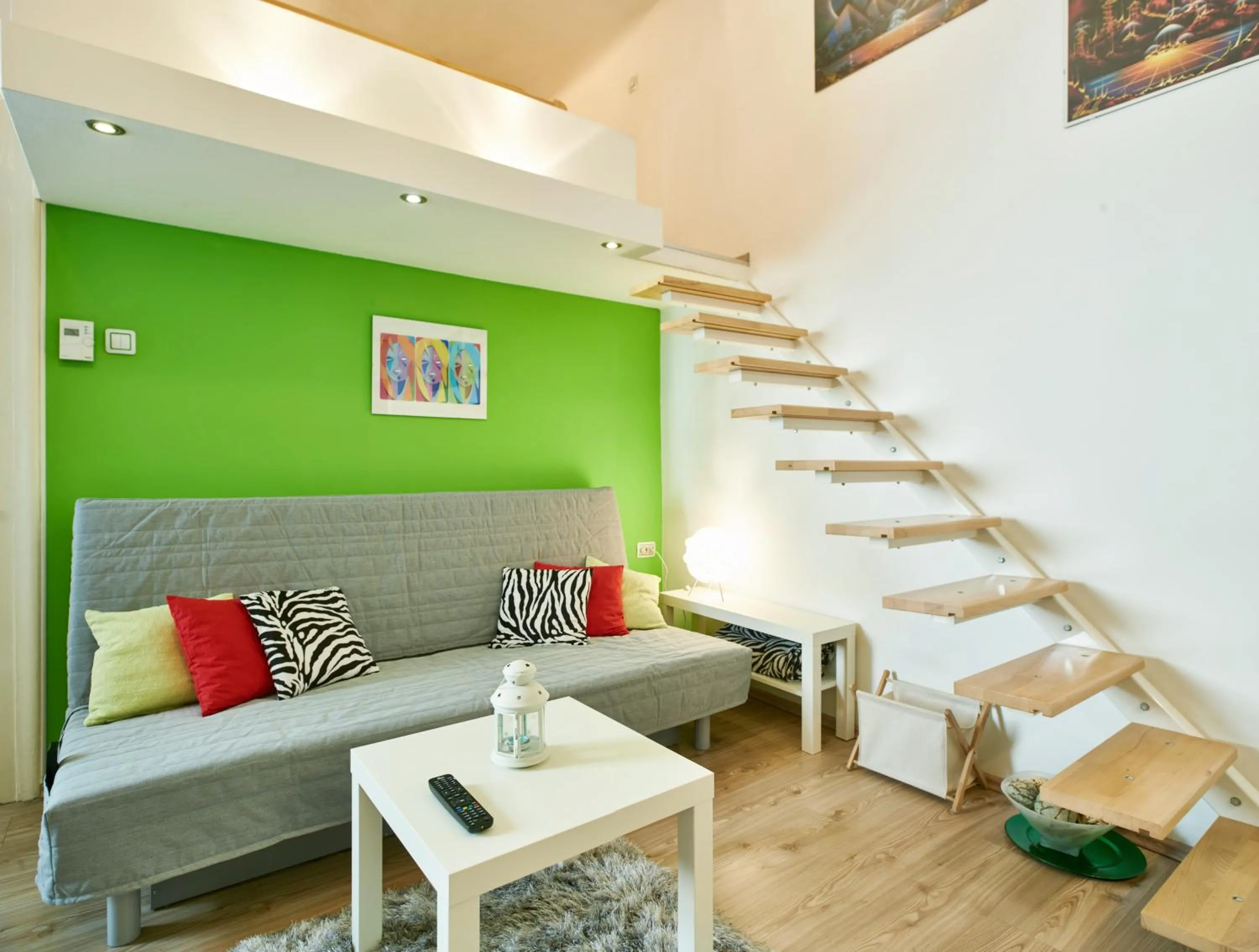 Living room in Studio Apartment Green Wall