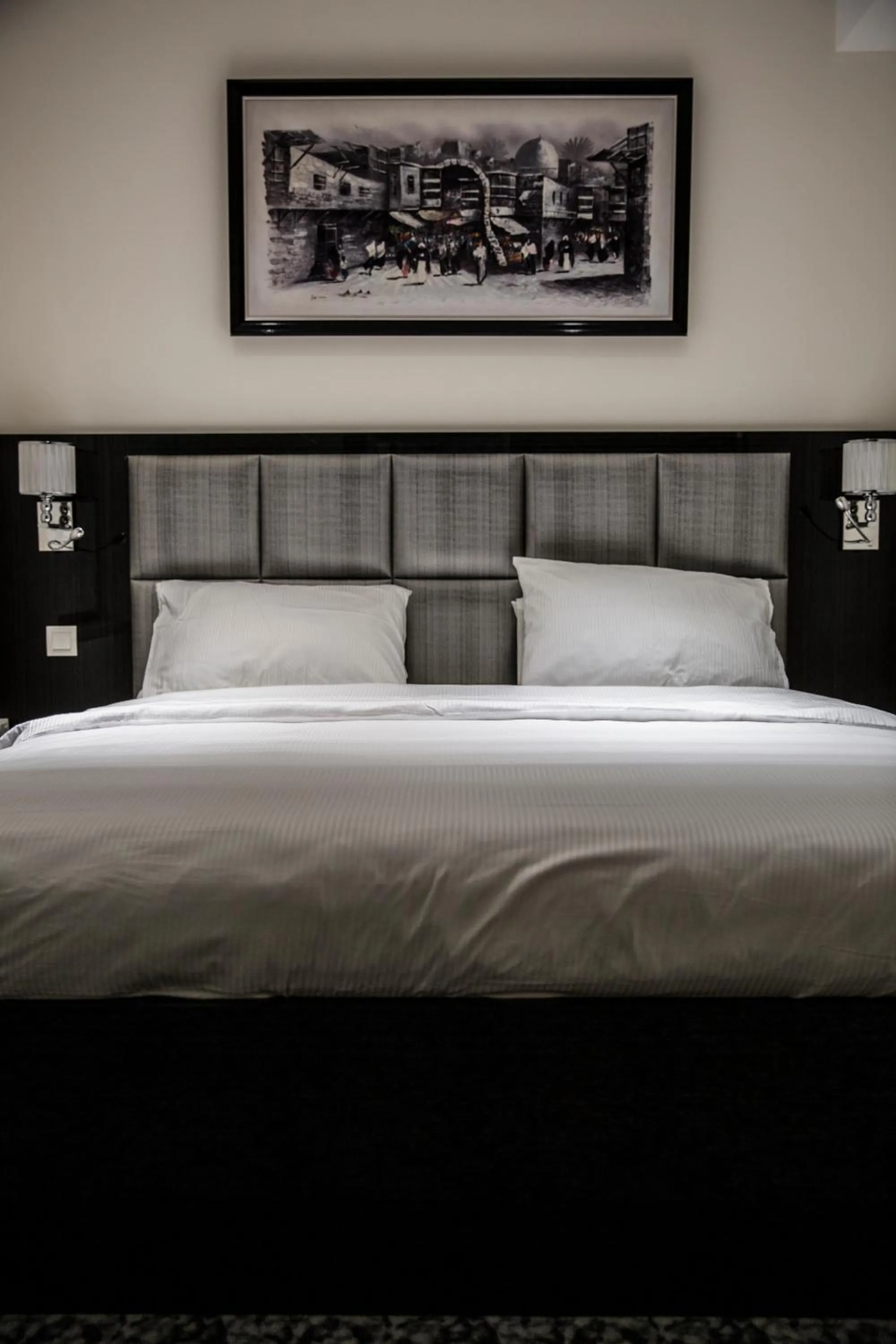 Bed in Naylover Hotel Suites