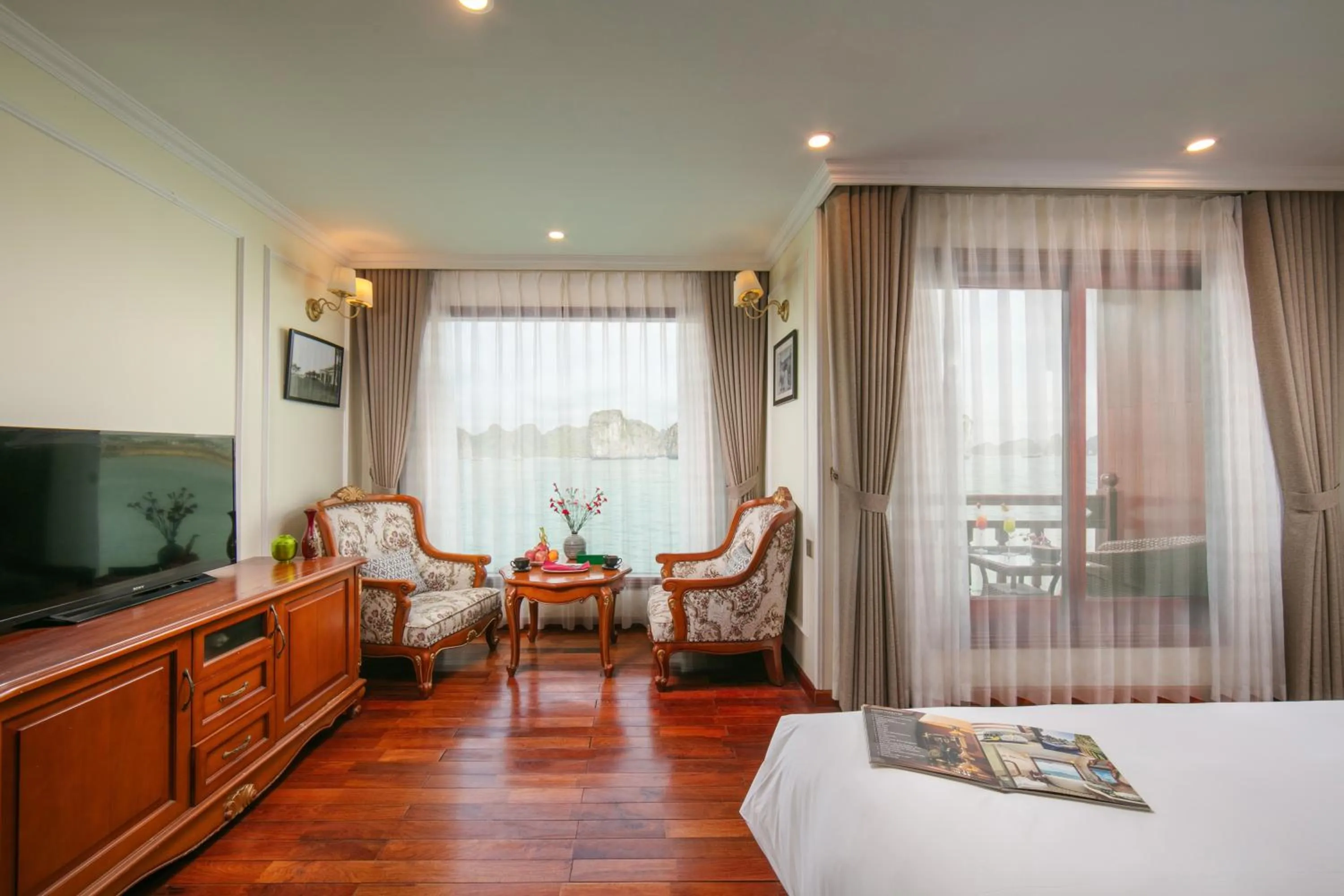 Bed in Emperor Cruises Legacy Ha Long